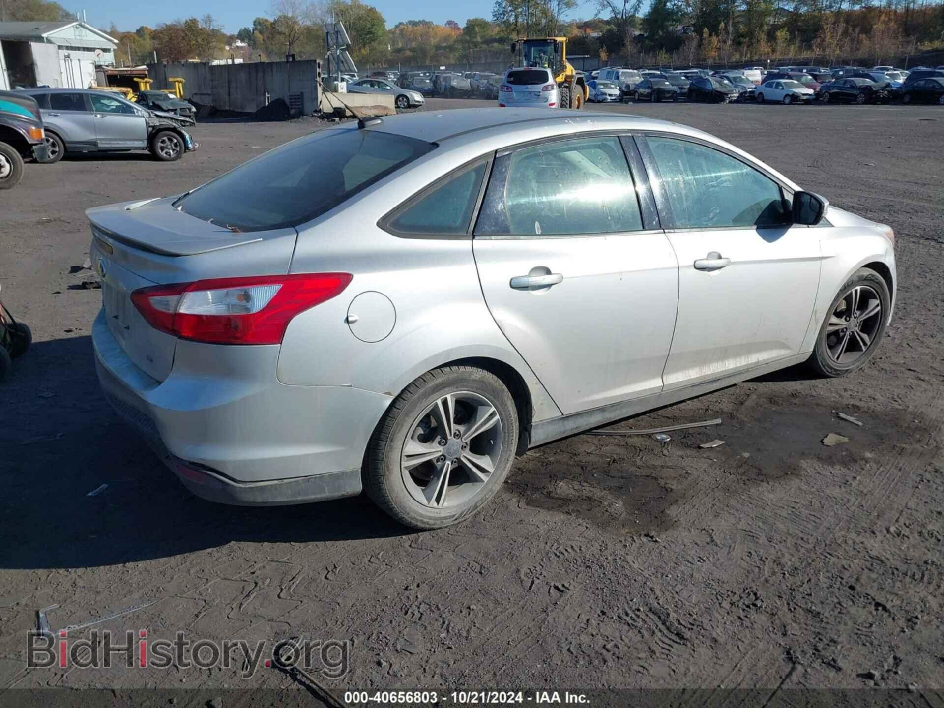 2014 FORD FOCUS - VIN: 1FADP3F22EL251072 - Photo 4