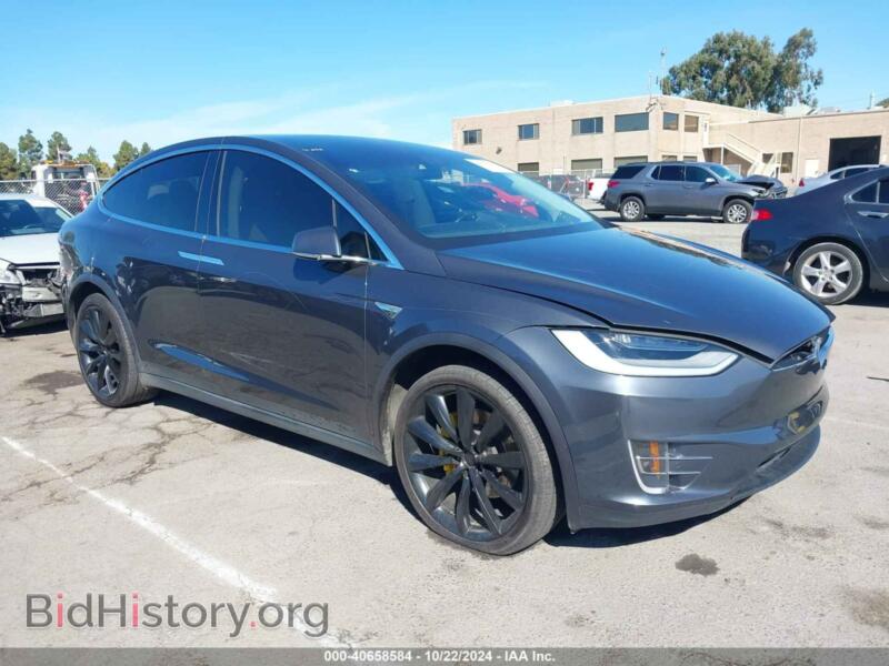 2016 Tesla MODEL X (VIN 5YJXCBE21GF002637) — photo 1 of 15, IAAI, damage: front & rear