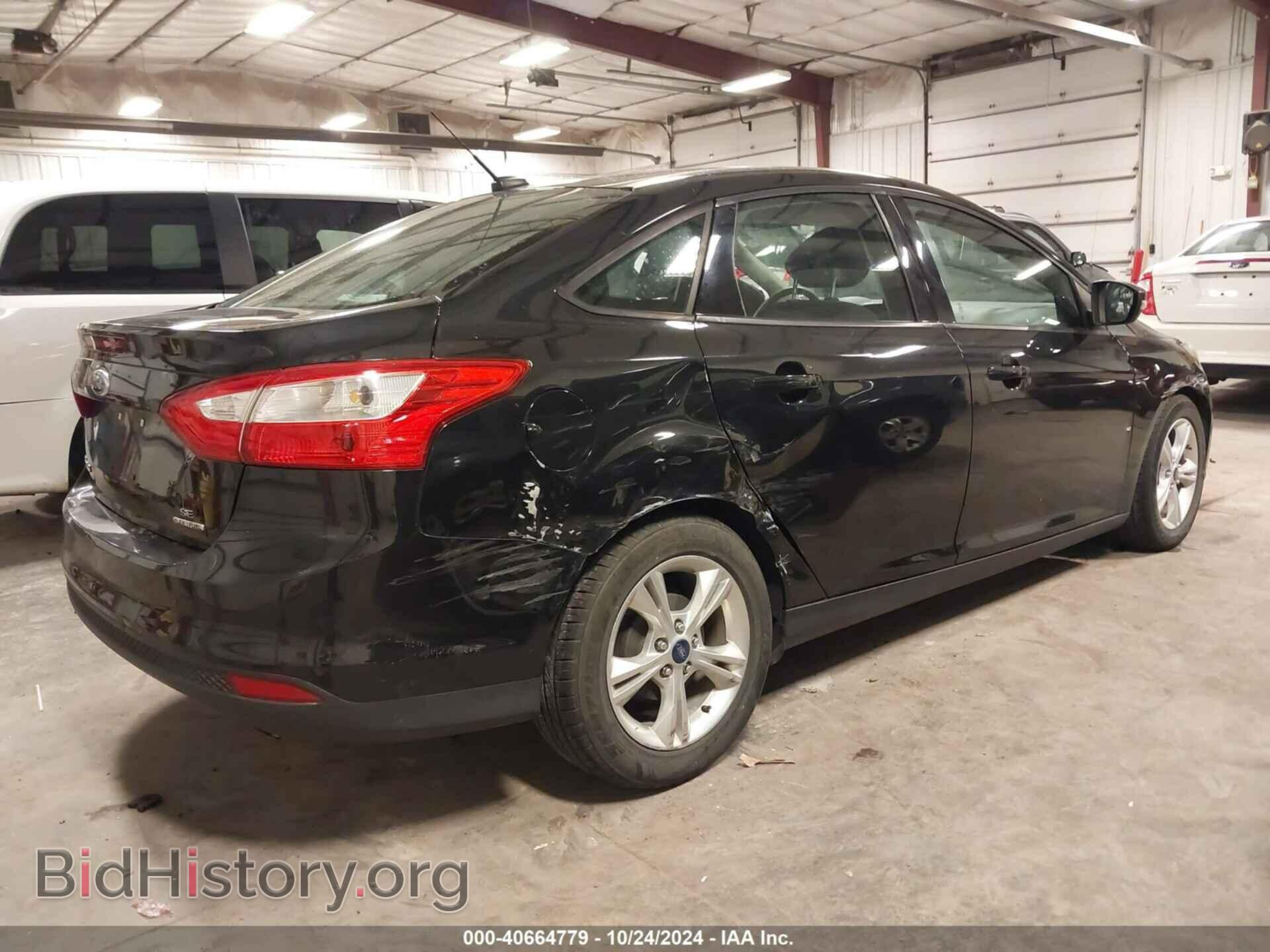 2014 FORD FOCUS - VIN: 1FADP3F27EL205026 - Photo 4