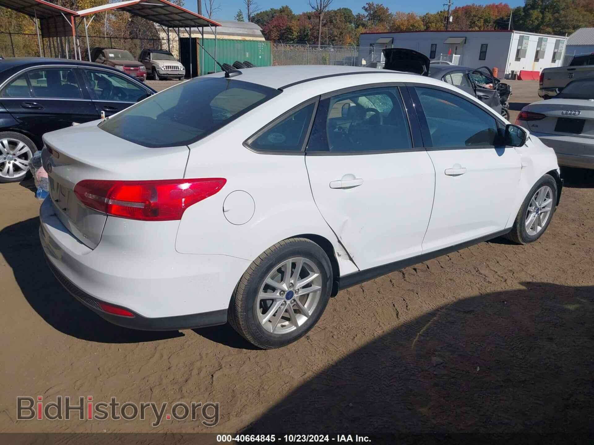 2016 FORD FOCUS - VIN: 1FADP3F2XGL385136 - Photo 4