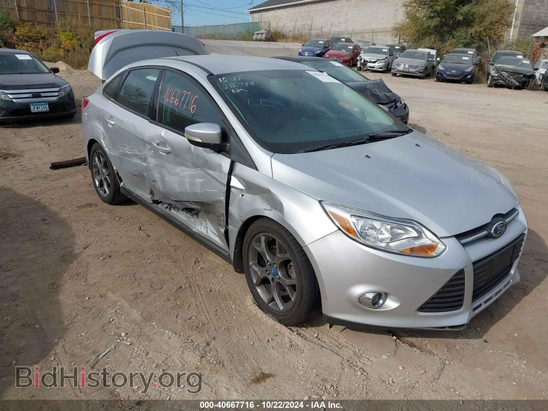 Фотография 1FADP3F25EL143089 - FORD FOCUS 2014