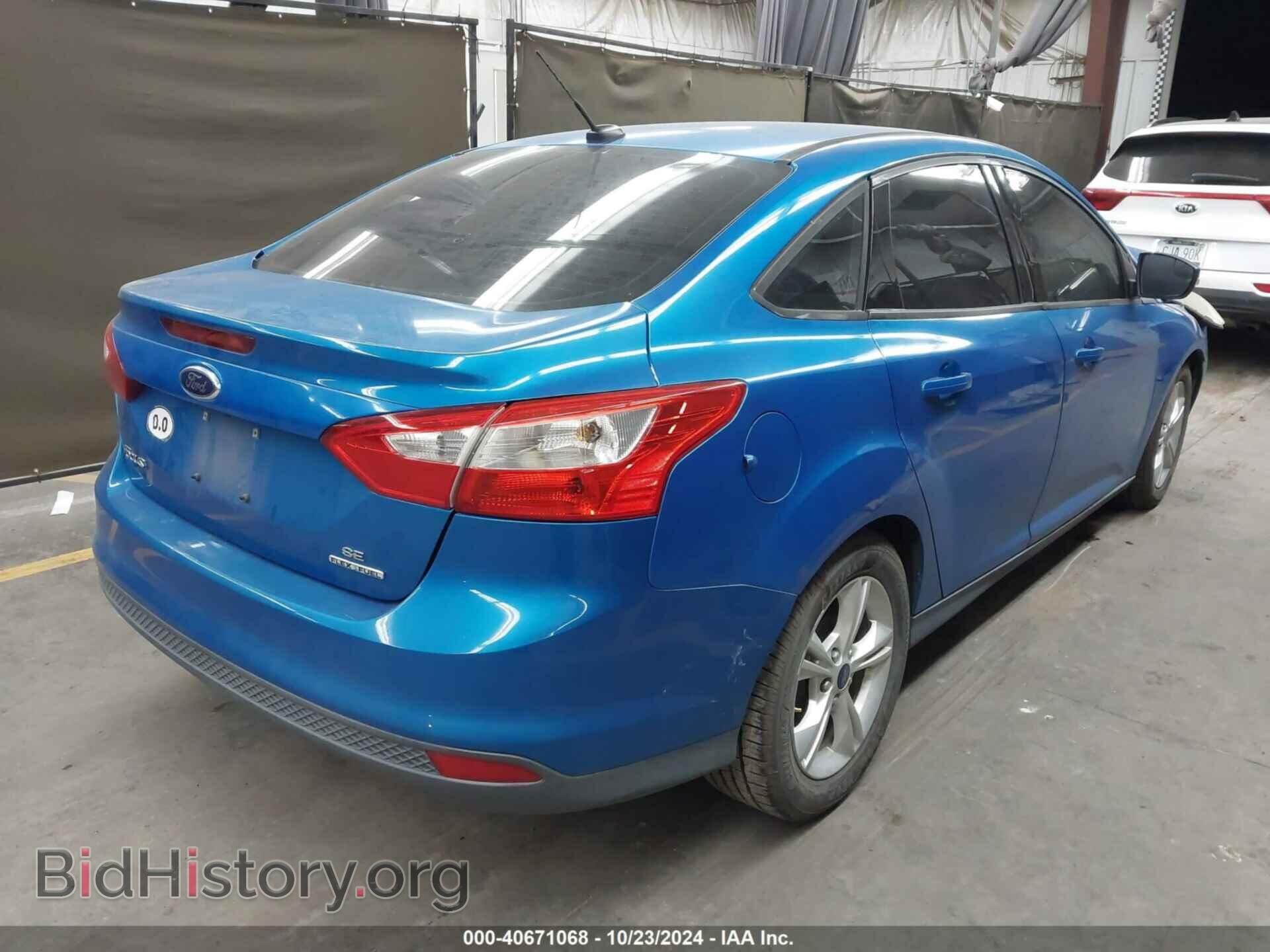 2014 FORD FOCUS - VIN: 1FADP3F22EL143681 - Photo 4