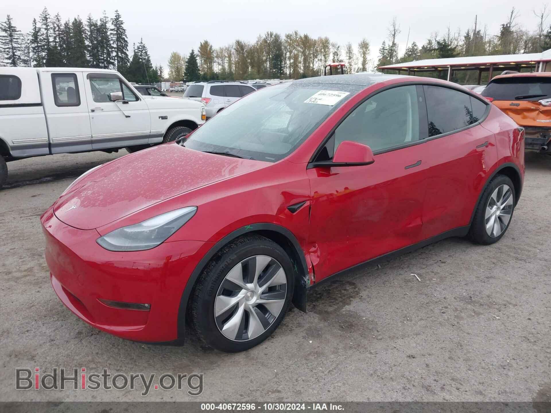 2023 TESLA MODEL Y - VIN: 7SAYGDEE2PF866212 - Фото 2
