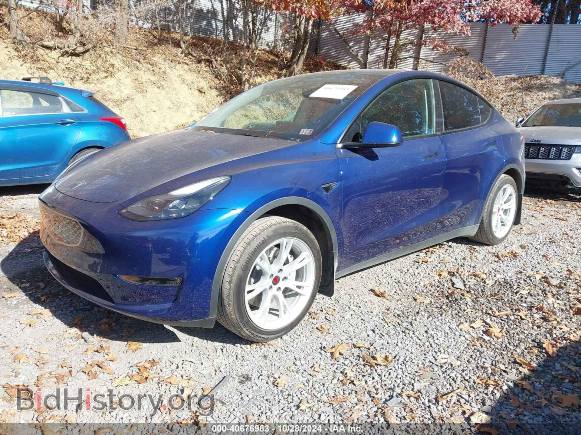 2023 TESLA MODEL Y - VIN: 7SAYGDEEXPF671507 - Фото 2