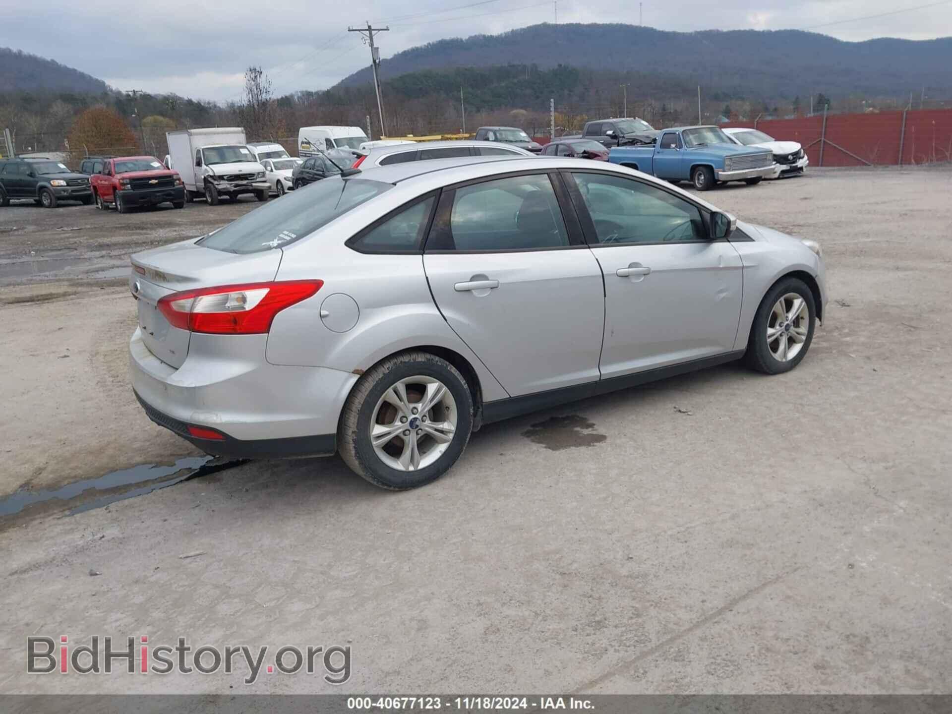 2014 FORD FOCUS - VIN: 1FADP3F2XEL334491 - Фото 4