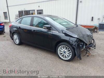2014 Ford FOCUS Titanium, black — VIN 1FADP3J25EL310199, IAAI