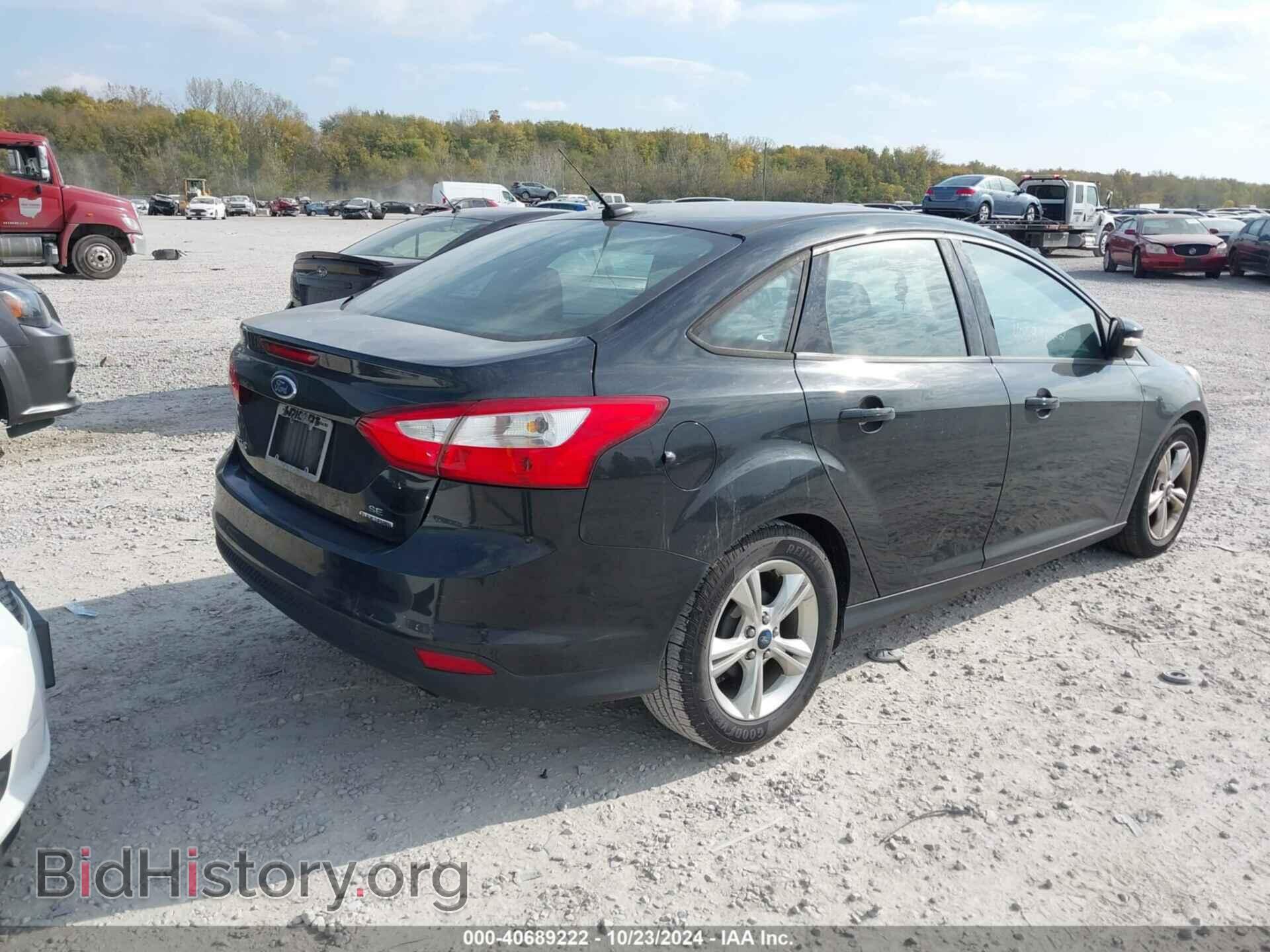 2014 FORD FOCUS - VIN: 1FADP3F26EL217832 - Photo 4
