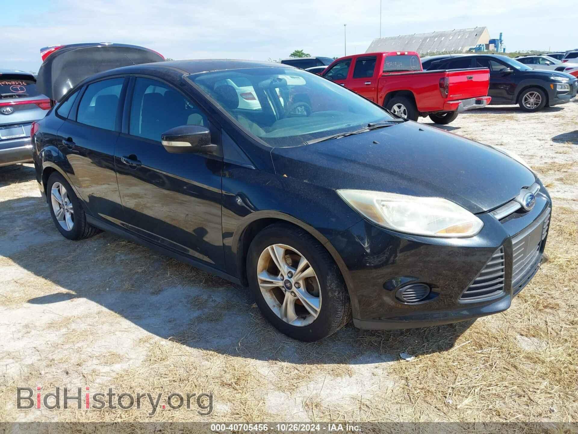 Фотография 1FADP3F29EL291990 - FORD FOCUS 2014
