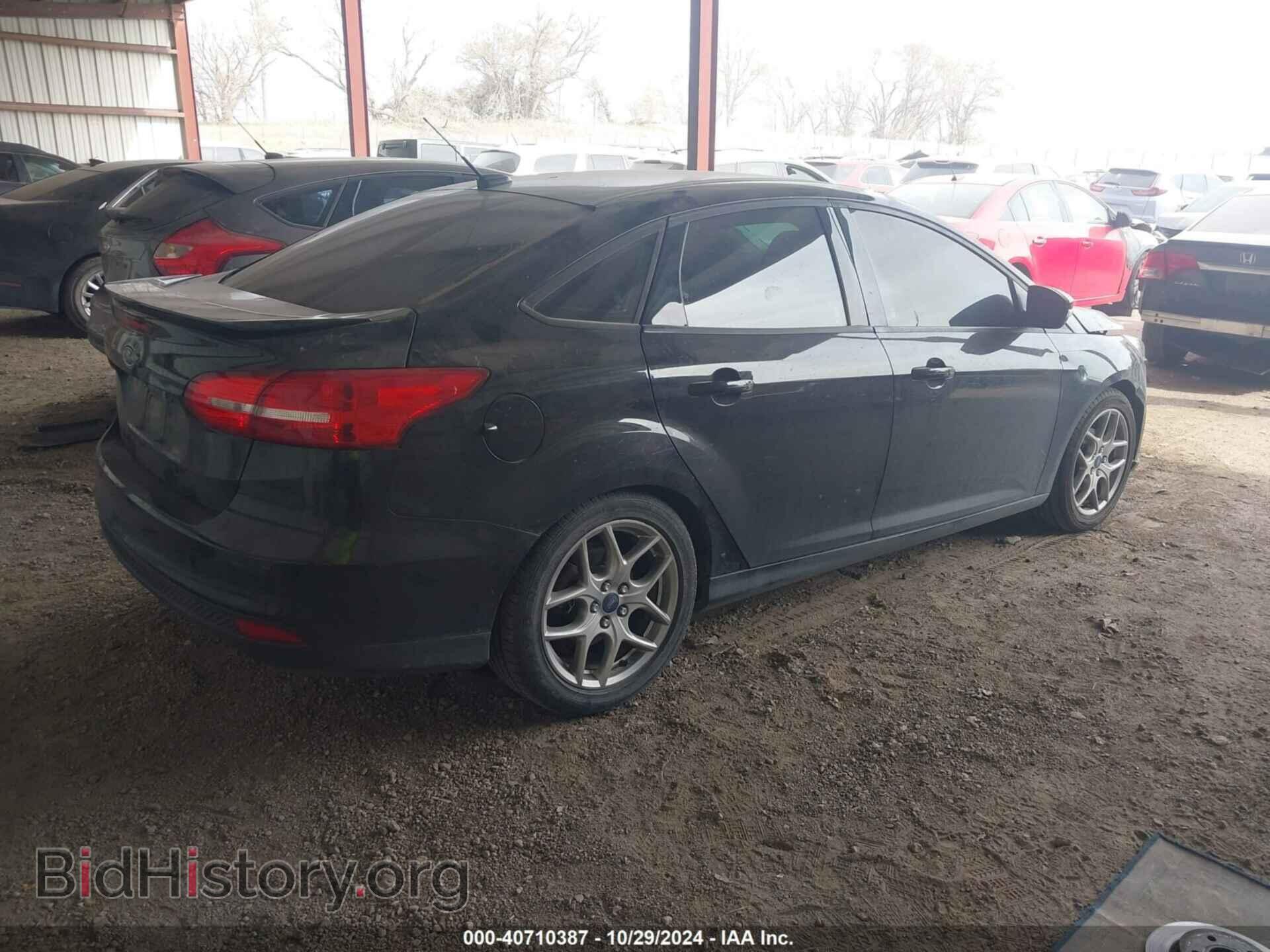2015 FORD FOCUS - VIN: 1FADP3F29FL379908 - Photo 4