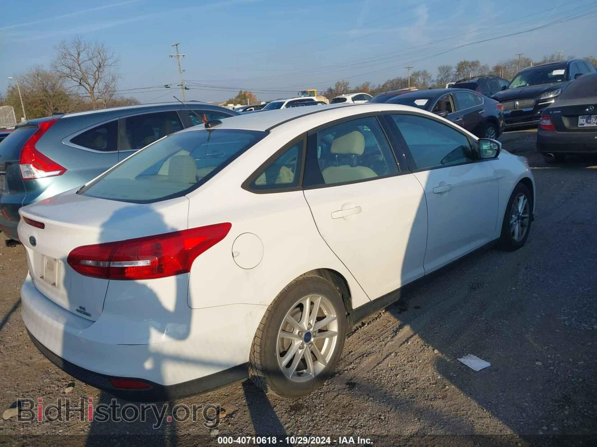 2016 FORD FOCUS - VIN: 1FADP3F22GL201033 - Фото 4