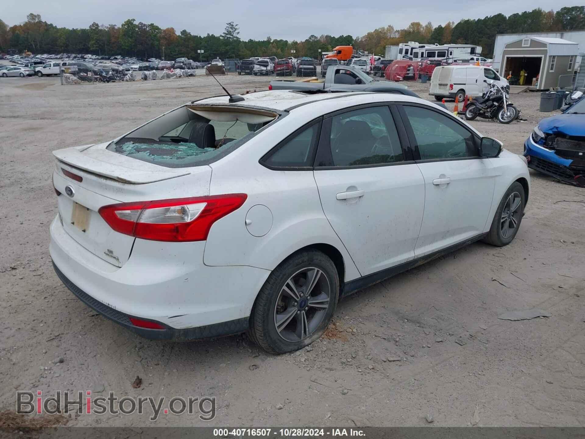 2014 FORD FOCUS - VIN: 1FADP3F2XEL345071 - Photo 4