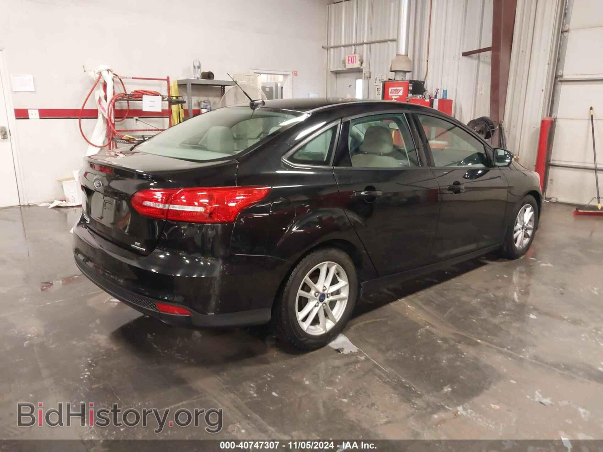 2015 FORD FOCUS - VIN: 1FADP3F24FL337033 - Photo 4