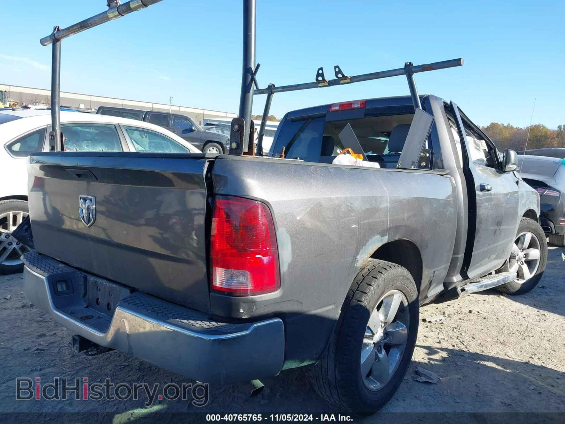 2014 RAM 1500 - VIN: 3C6JR7BG4EG204985 - Фото 4