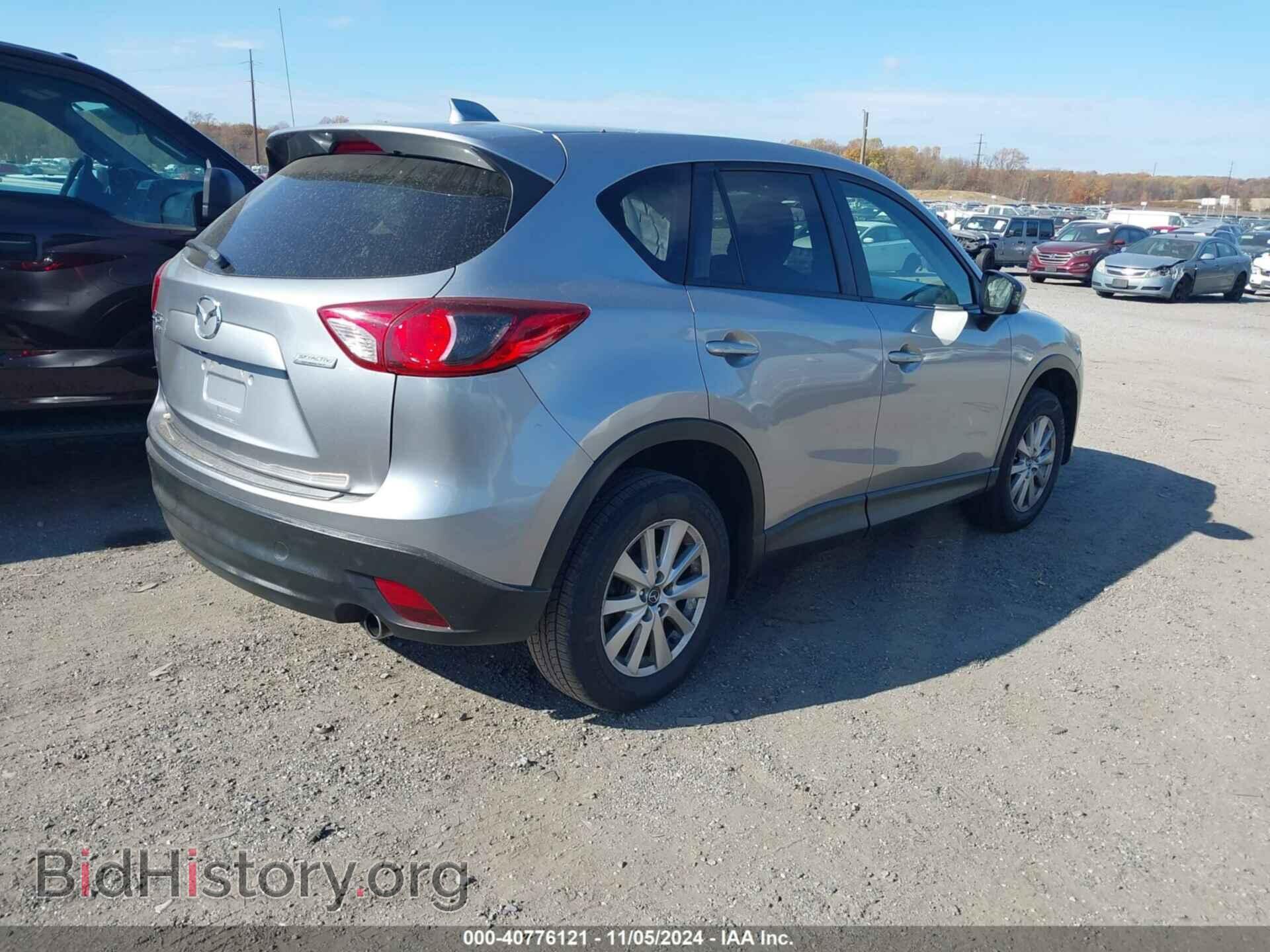 2014 MAZDA CX-5 - VIN: JM3KE4CY4E0425027 - Фото 4