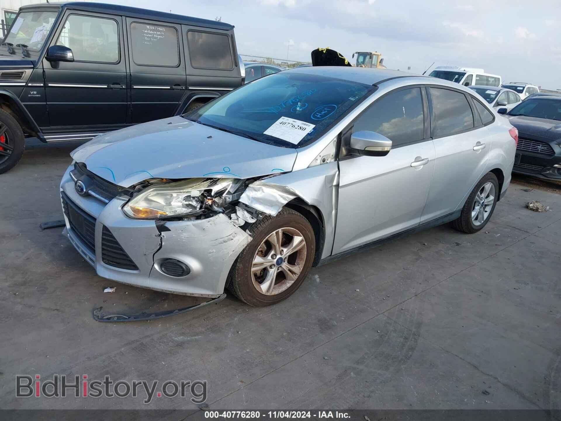 2014 FORD FOCUS - VIN: 1FADP3F2XEL451844 - Photo 2