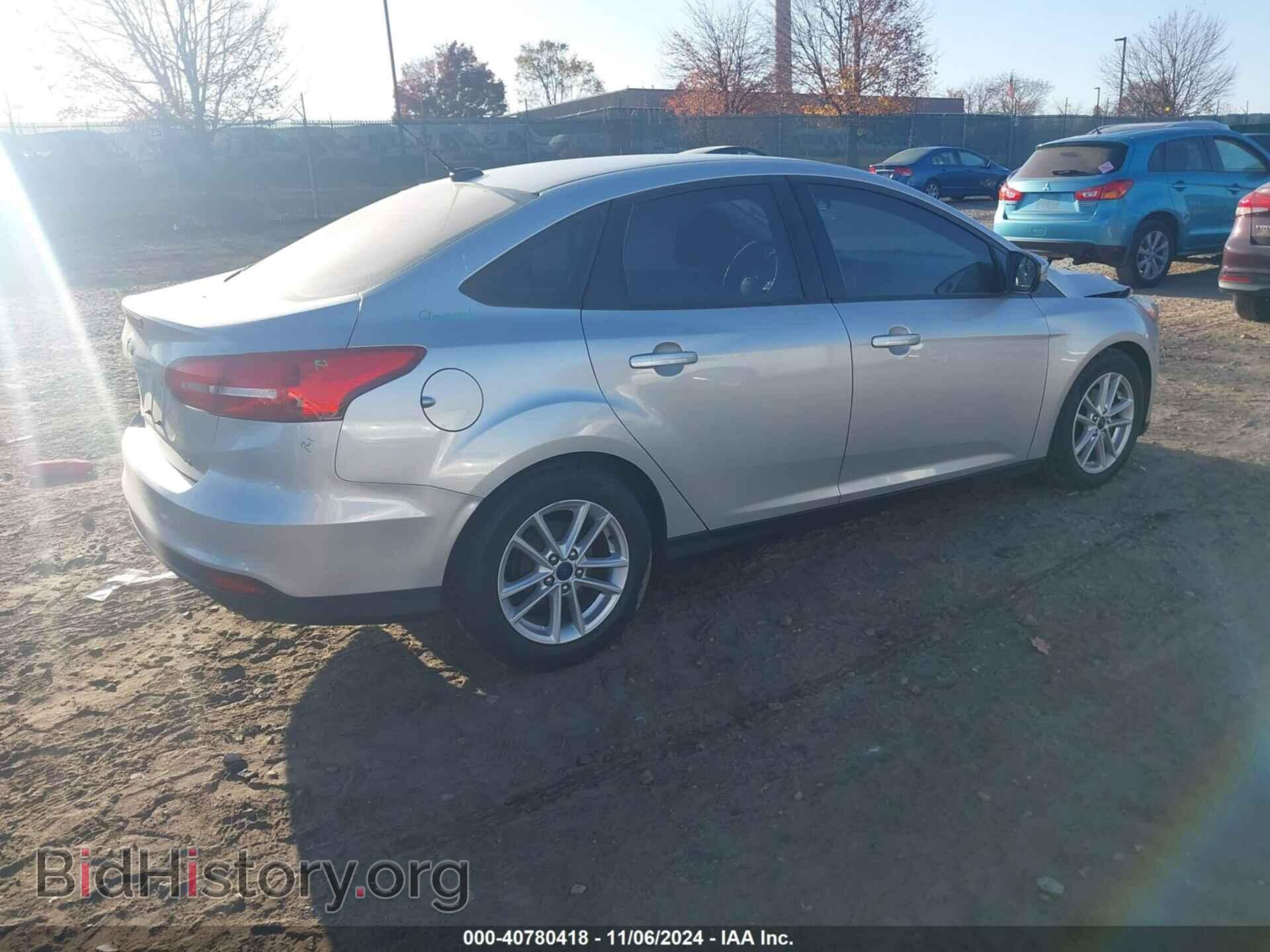 2016 FORD FOCUS - VIN: 1FADP3F2XGL335076 - Фото 4