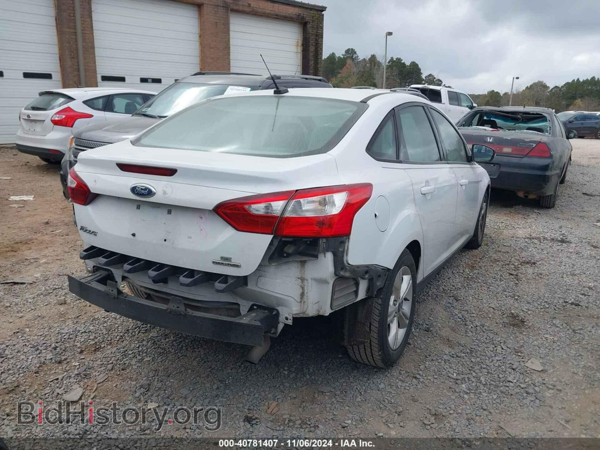 2014 FORD FOCUS - VIN: 1FADP3F20EL374871 - Photo 4