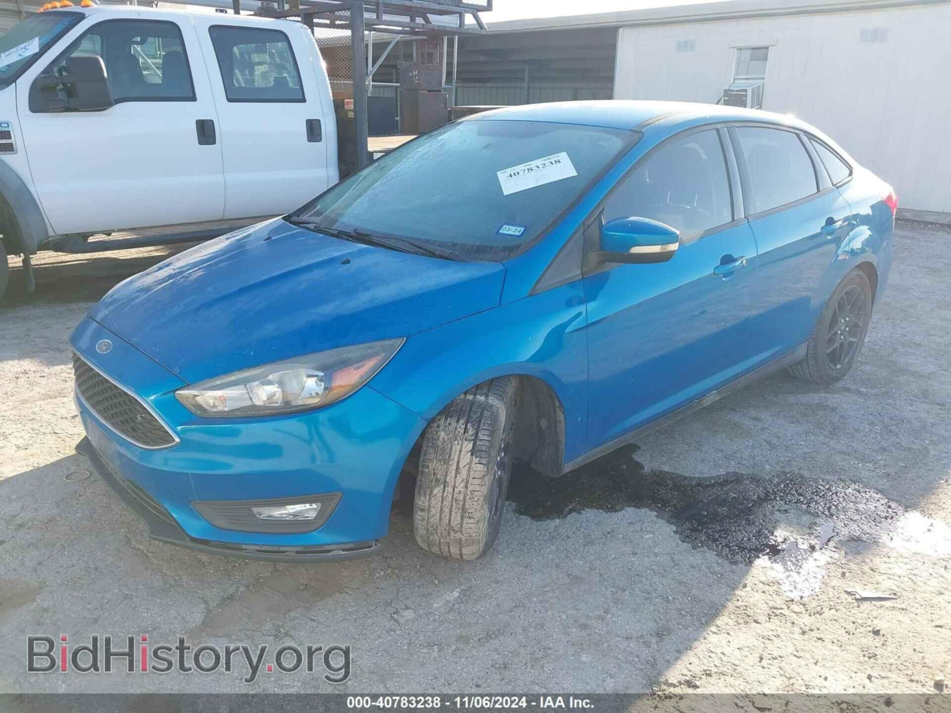 2016 FORD FOCUS - VIN: 1FADP3F22GL386748 - Фото 2