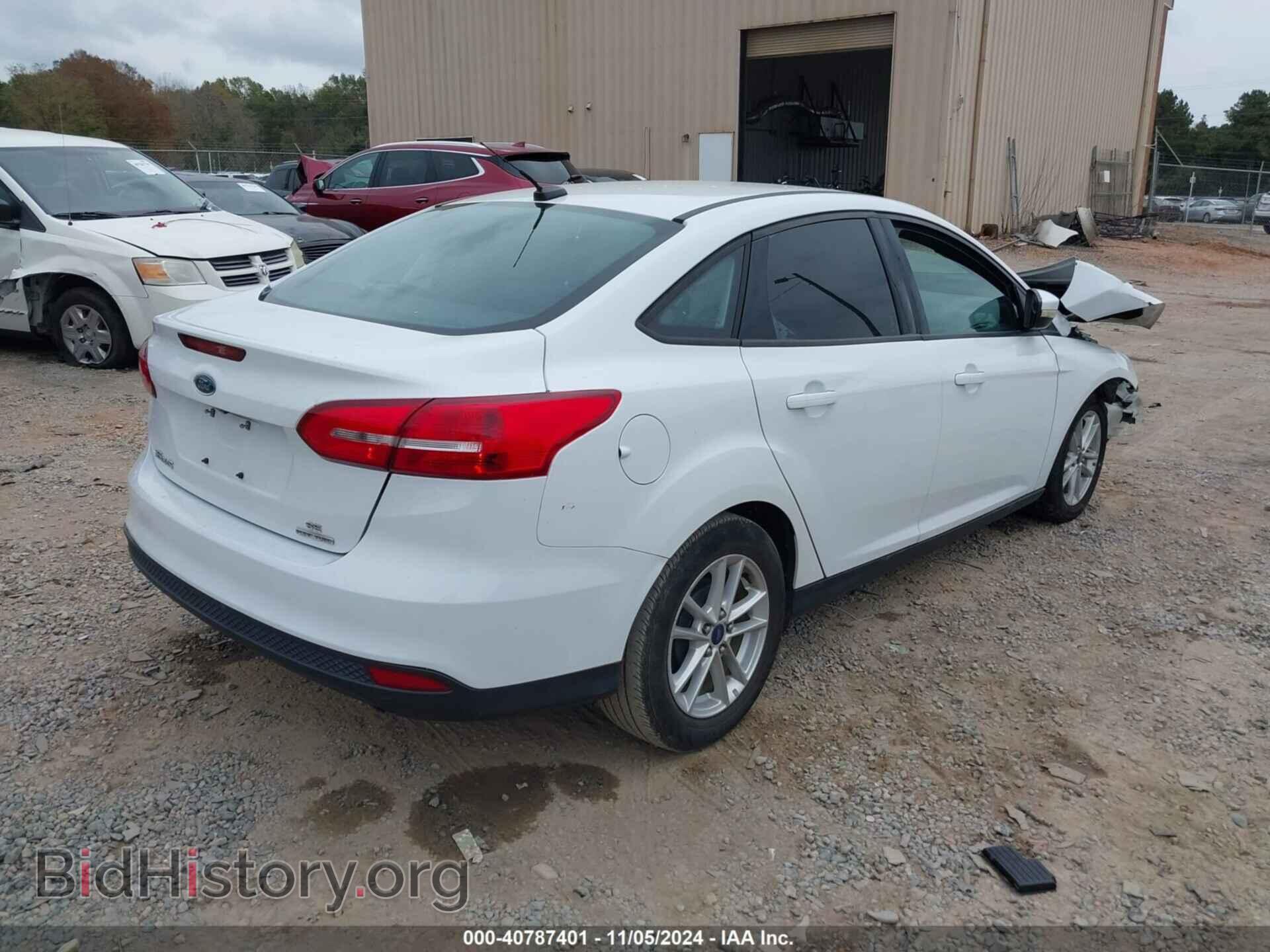 2016 FORD FOCUS - VIN: 1FADP3F27GL217969 - Photo 4