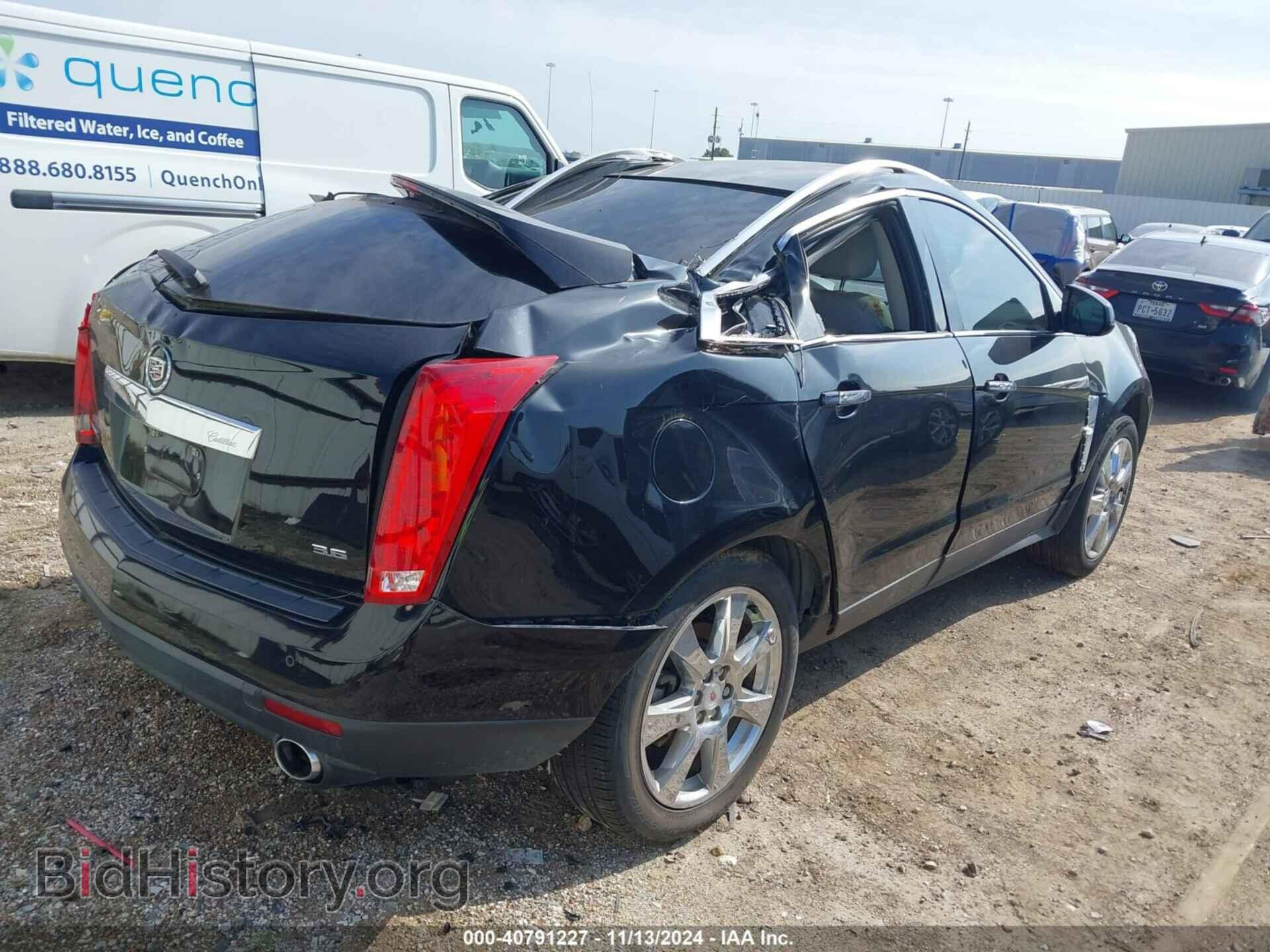 2014 CADILLAC SRX - VIN: 3GYFNCE39ES577975 - Photo 4