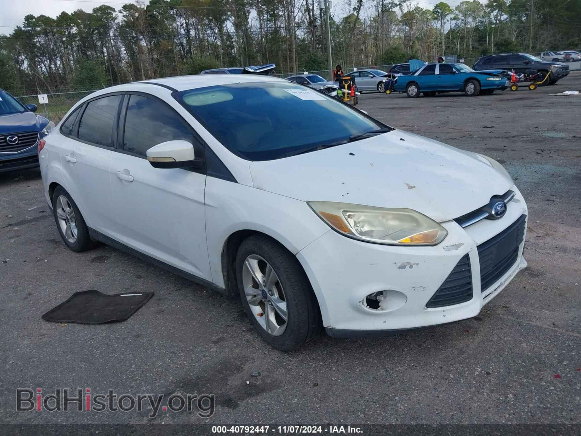 Фотография 1FADP3F24EL291900 - FORD FOCUS 2014