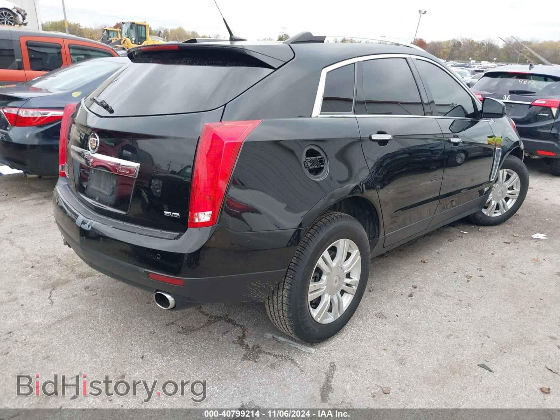 2014 CADILLAC SRX - VIN: 3GYFNBE36ES682029 - Фото 4