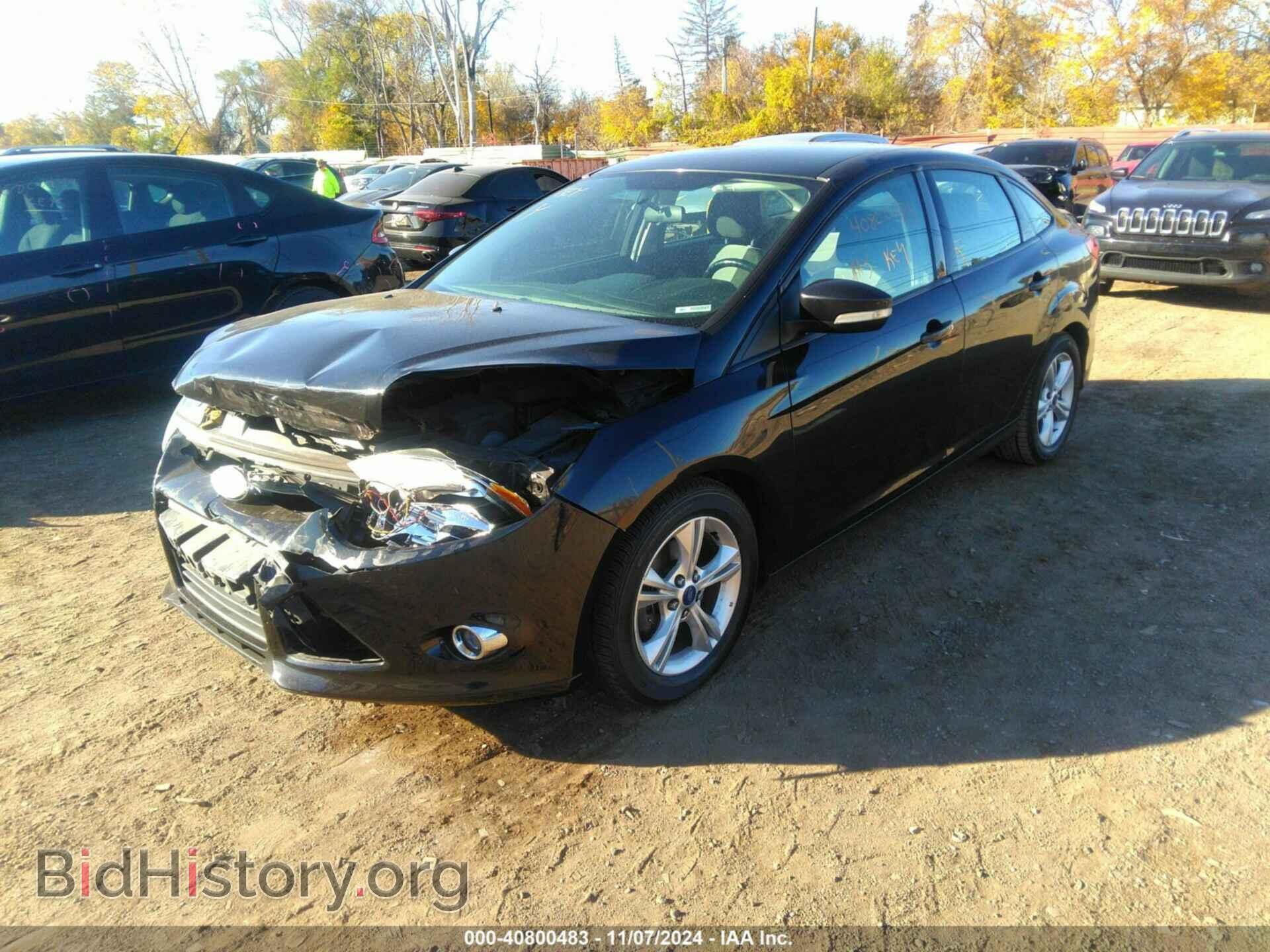 2014 FORD FOCUS - VIN: 1FADP3F20EL107472 - Photo 2
