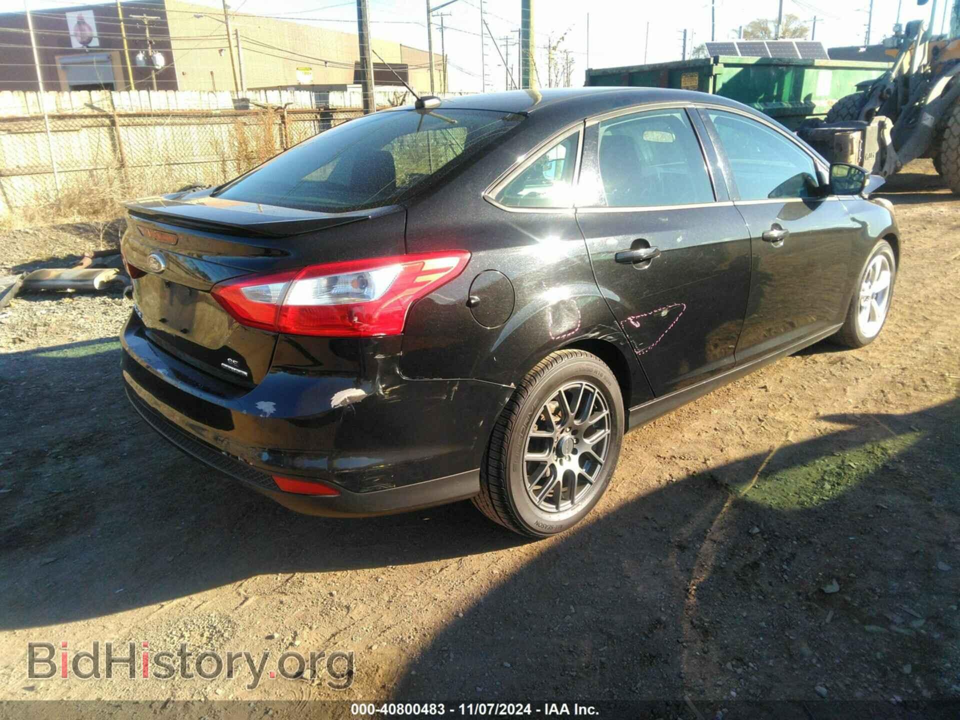 2014 FORD FOCUS - VIN: 1FADP3F20EL107472 - Photo 4