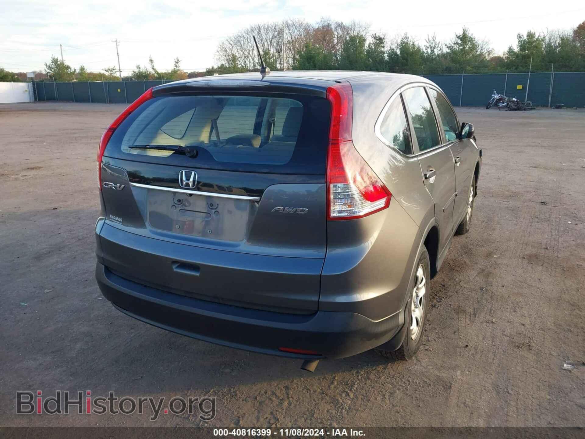 2014 HONDA CR-V - VIN: 5J6RM4H38EL072906 - Фото 4