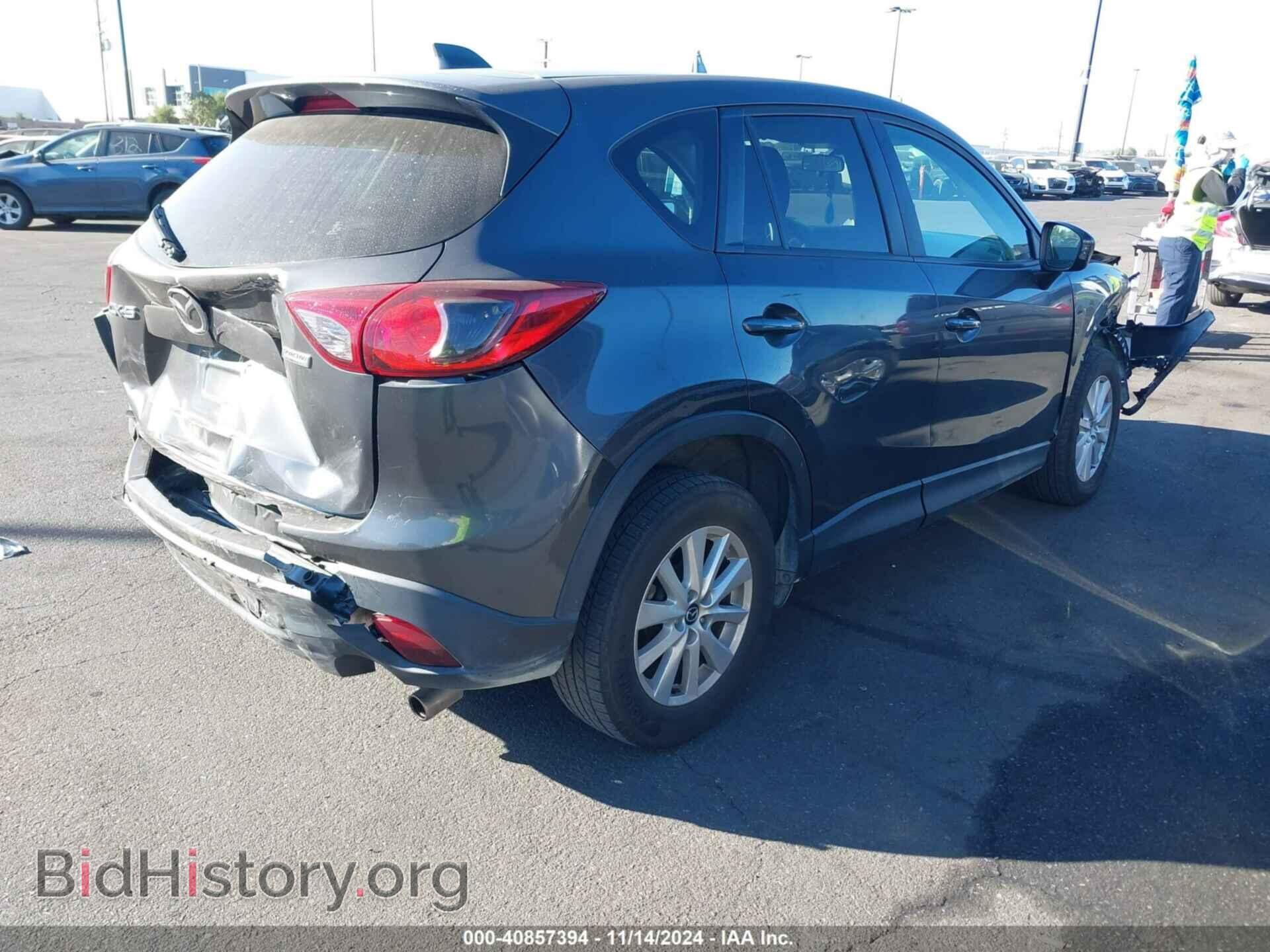 2014 MAZDA CX-5 - VIN: JM3KE2CY2E0347500 - Фото 4