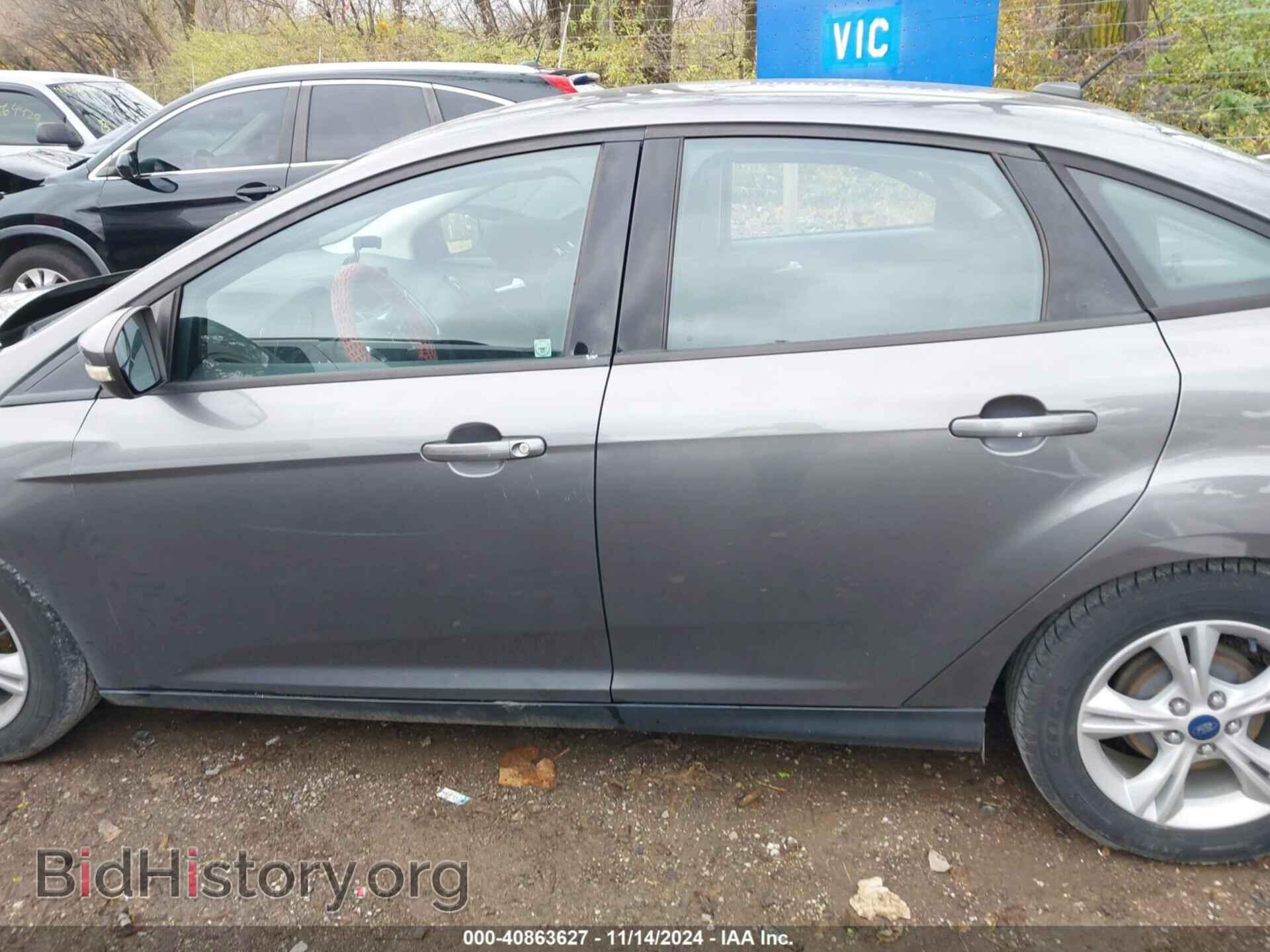 2014 FORD FOCUS - VIN: 1FADP3F24EL411615 - Фото 14