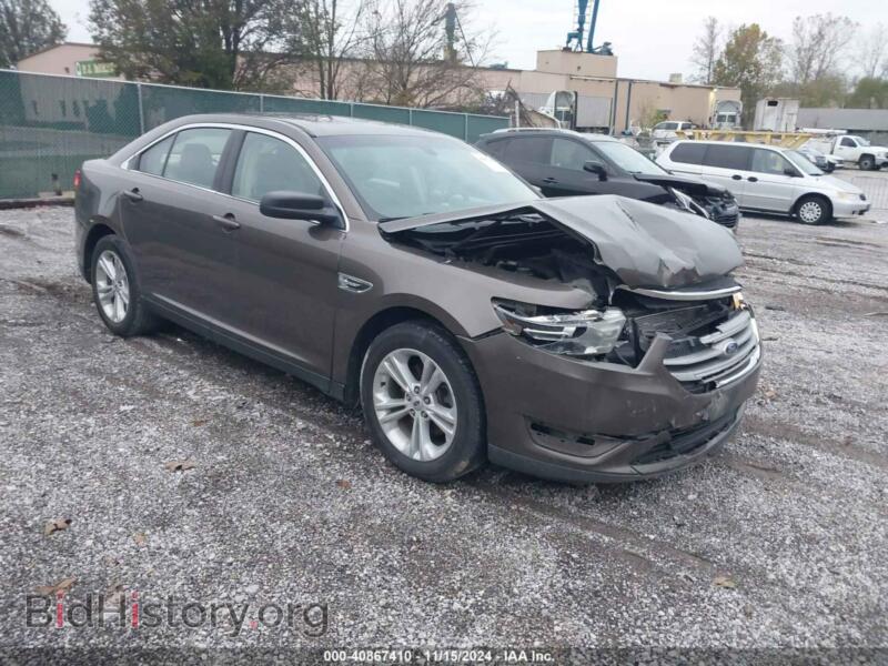 2015 Ford TAURUS SE (VIN 1FAHP2D83FG172667) — photo 1 of 16, IAAI, damage: front end