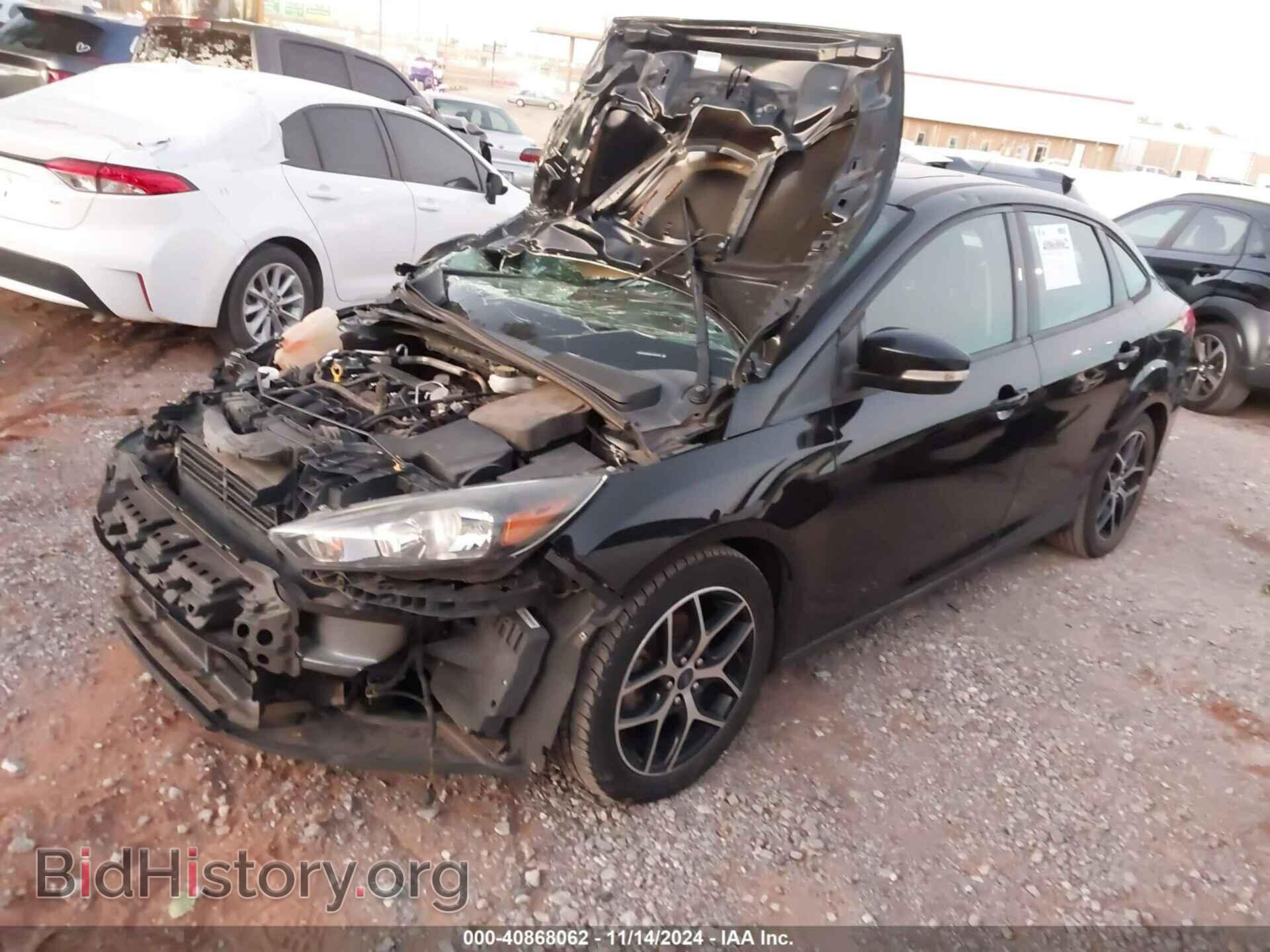2017 FORD FOCUS - VIN: 1FADP3H25HL318748 - Фото 2