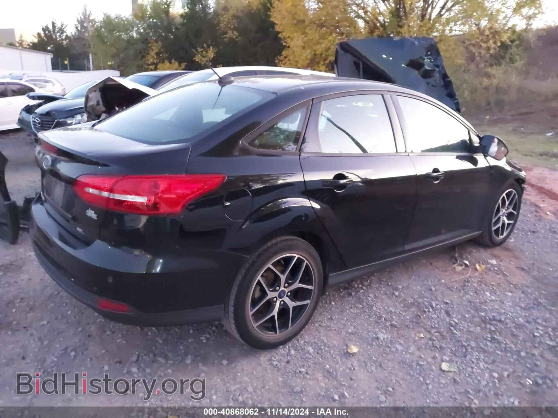 2017 FORD FOCUS - VIN: 1FADP3H25HL318748 - Фото 4