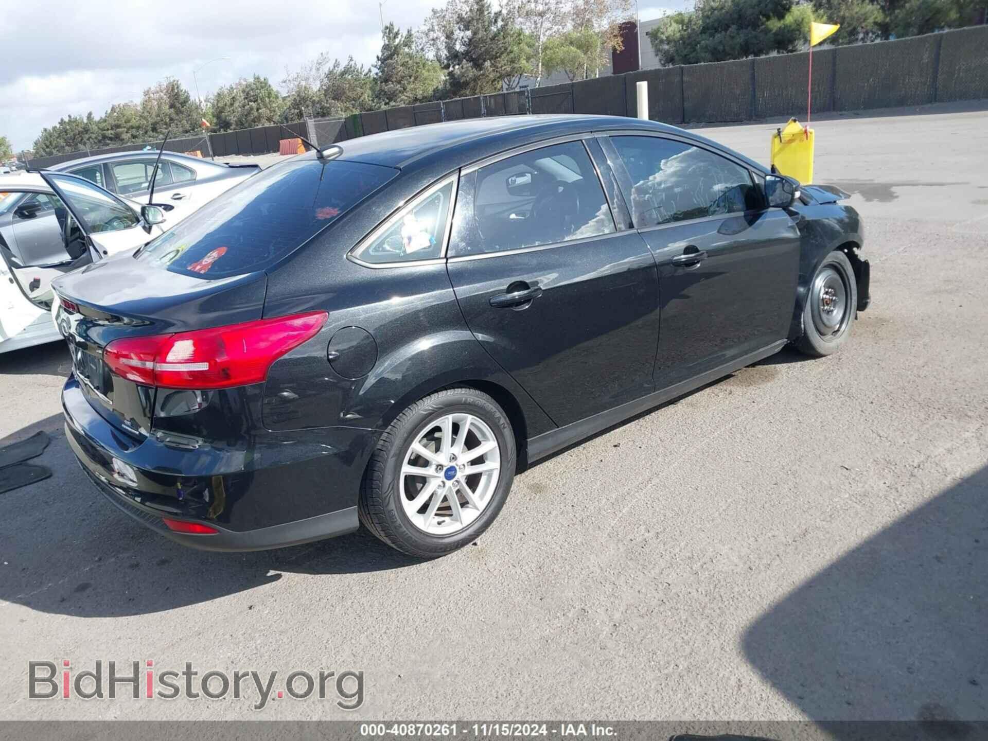 2015 FORD FOCUS - VIN: 1FADP3F23FL205610 - Photo 4
