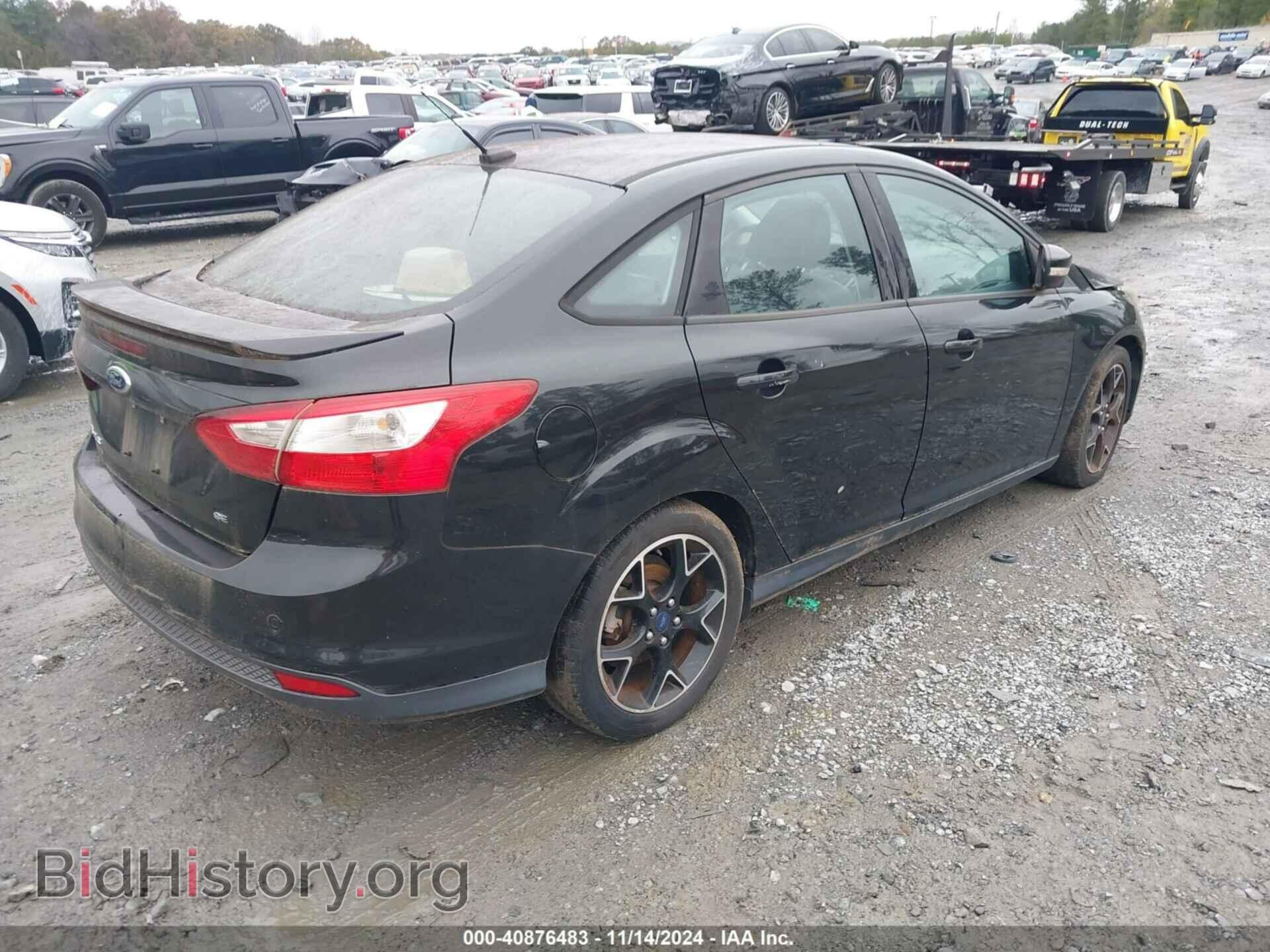 2014 FORD FOCUS - VIN: 1FADP3F23EL352931 - Photo 4