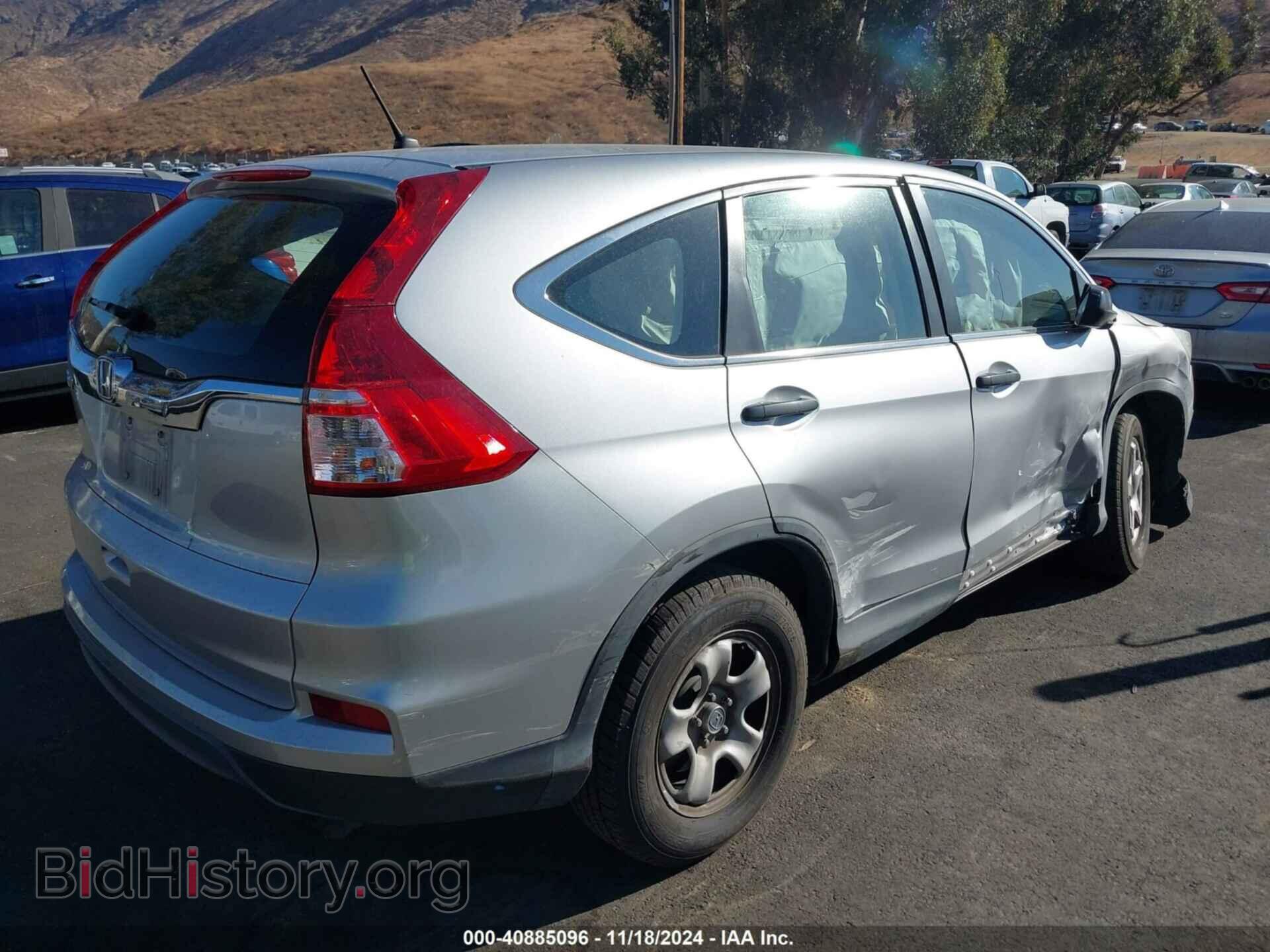 2015 HONDA CR-V - VIN: 3CZRM3H33FG715364 - Фото 4