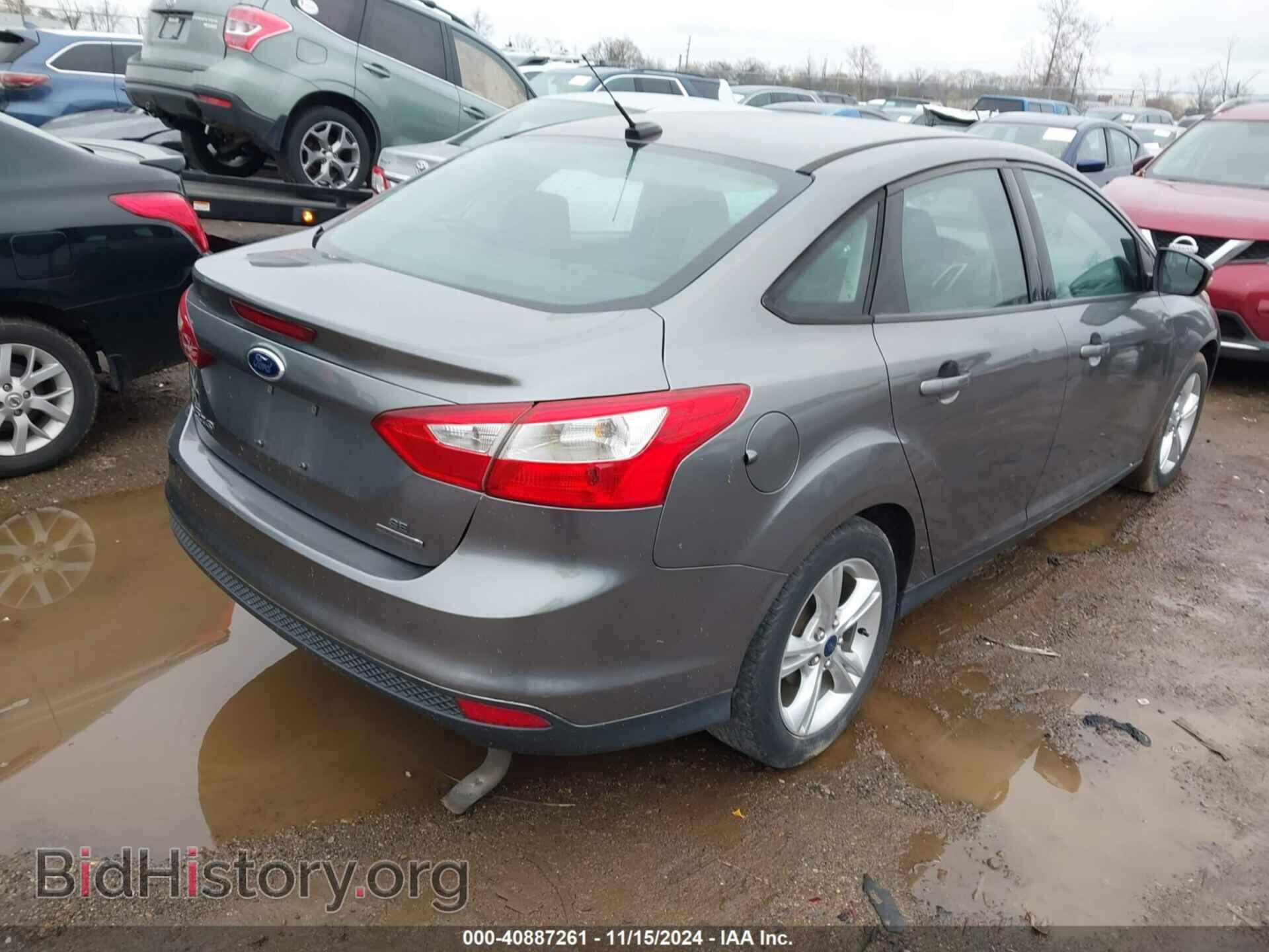 2014 FORD FOCUS - VIN: 1FADP3F24EL293002 - Photo 4