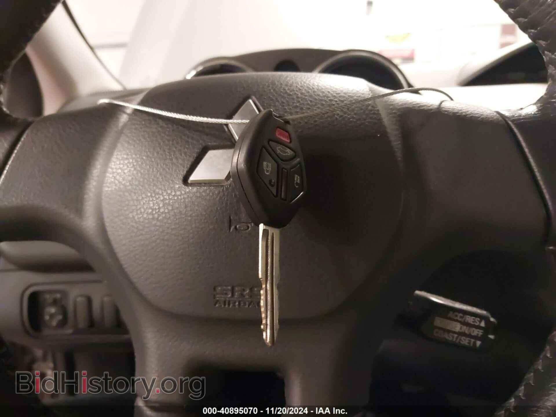 2009 MITSUBISHI ECLIPSE - VIN: 4A3AK24F59E019021 - Photo 11
