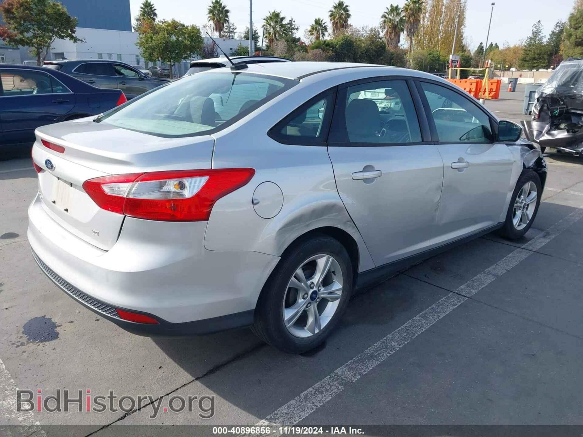 2014 FORD FOCUS - VIN: 1FADP3F21EL199319 - Photo 4