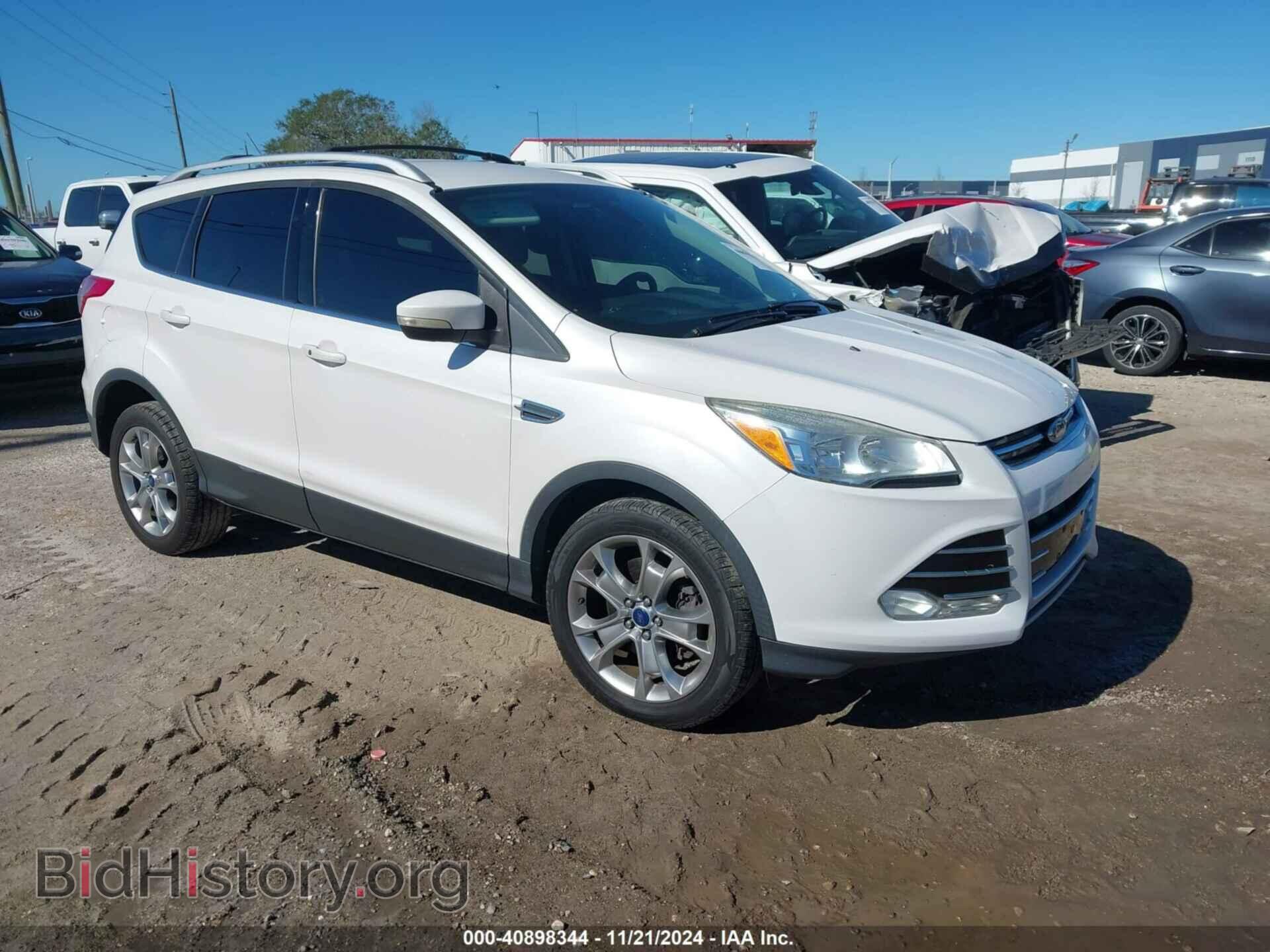 Фотография 1FMCU9J90EUD48217 - FORD ESCAPE 2014