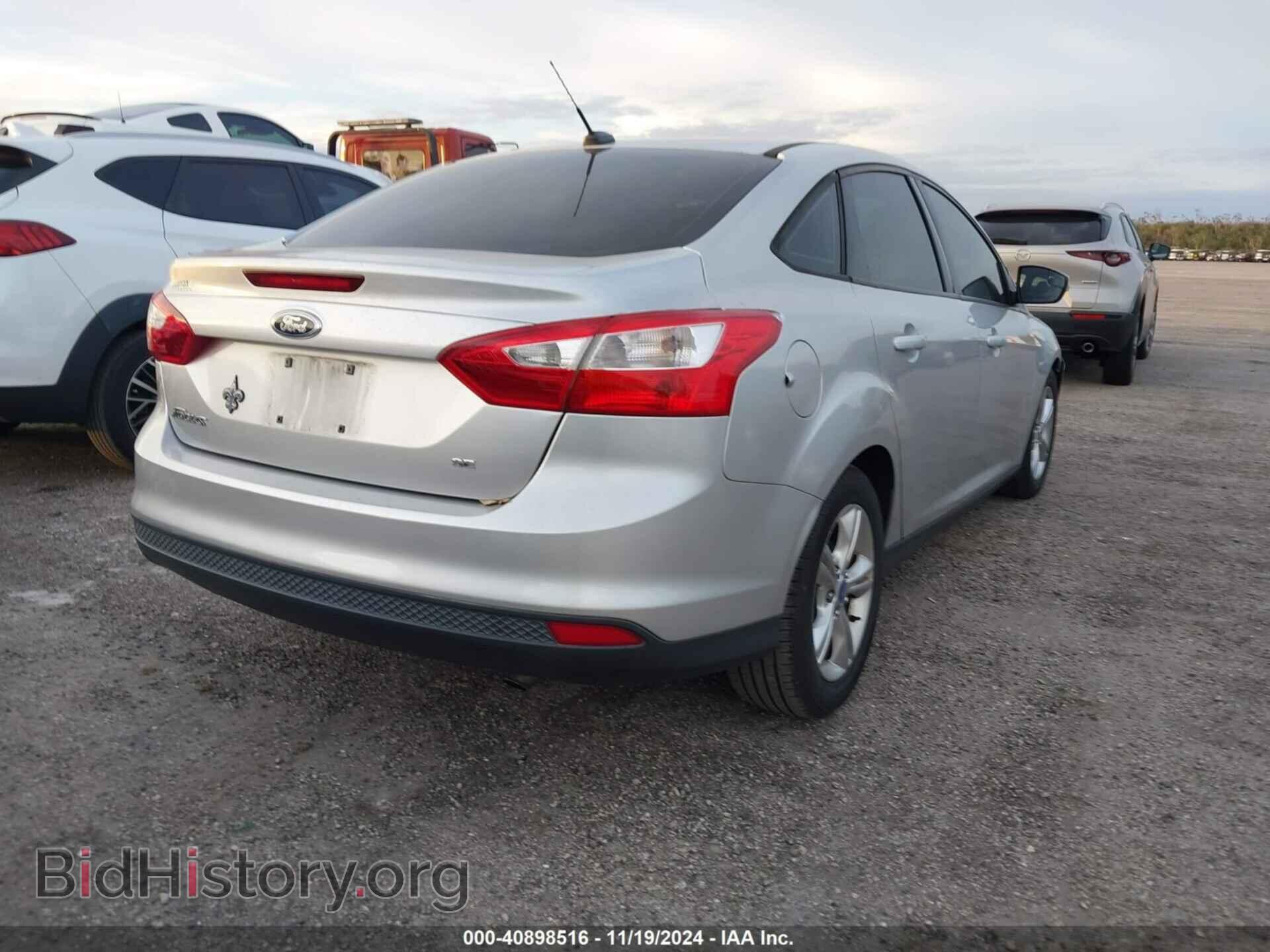 2013 FORD FOCUS - VIN: 1FADP3F24DL272178 - Photo 4