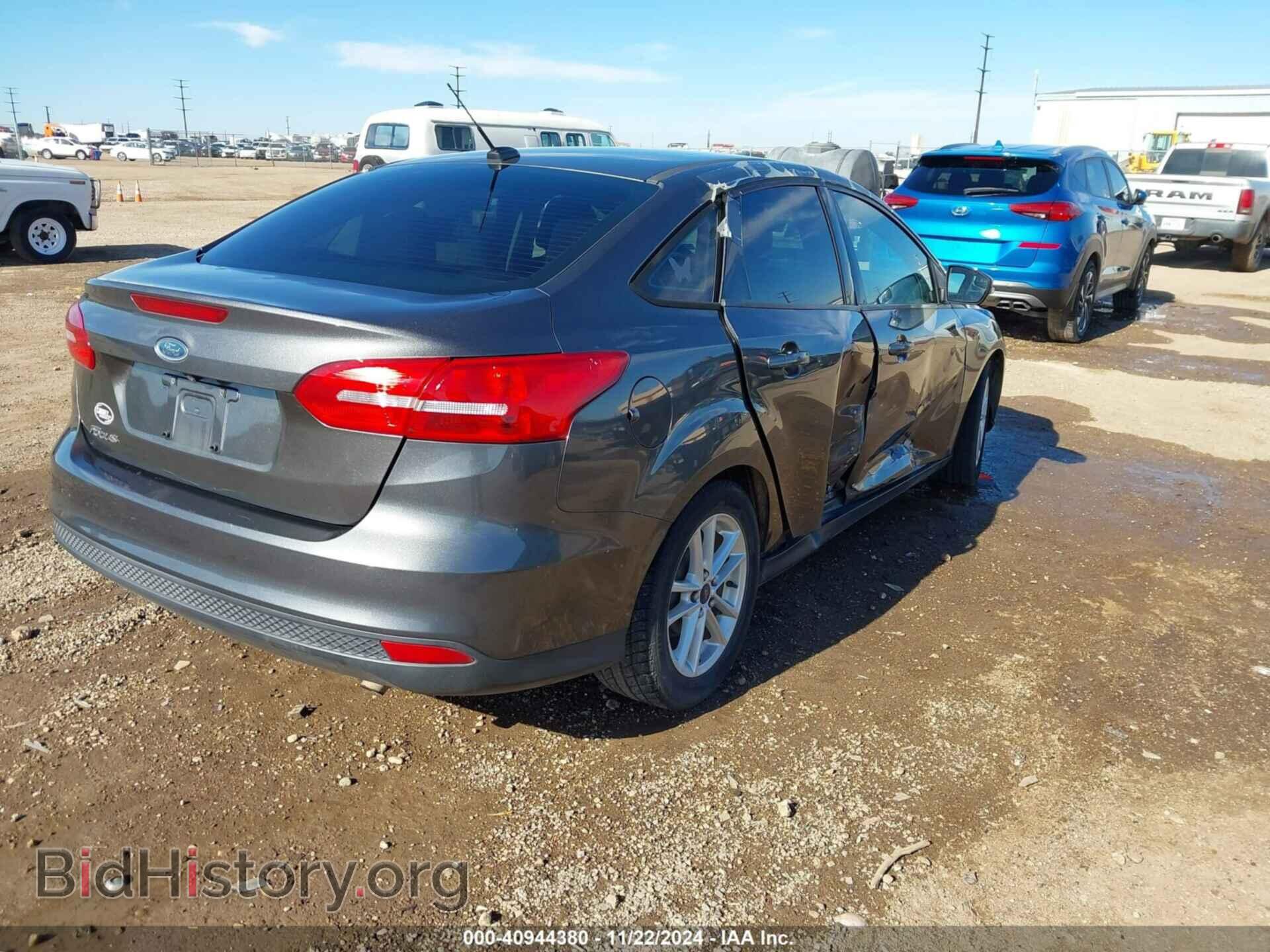 2015 FORD FOCUS - VIN: 1FADP3F29FL202811 - Photo 4
