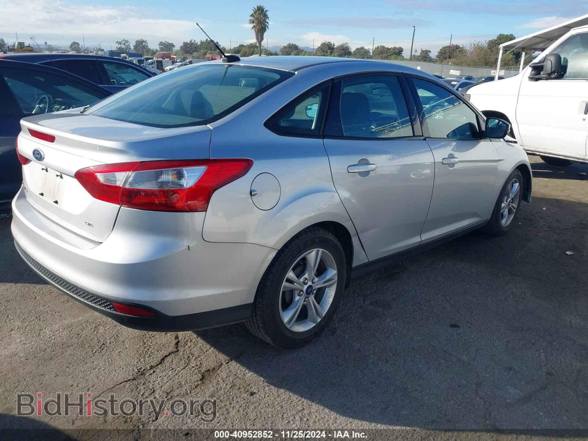 2014 FORD FOCUS - VIN: 1FADP3F26EL379007 - Photo 4
