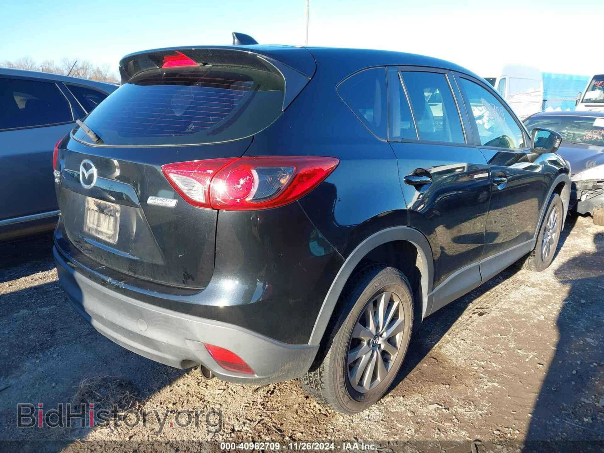 2014 MAZDA CX-5 - VIN: JM3KE4BE9E0405475 - Фото 4