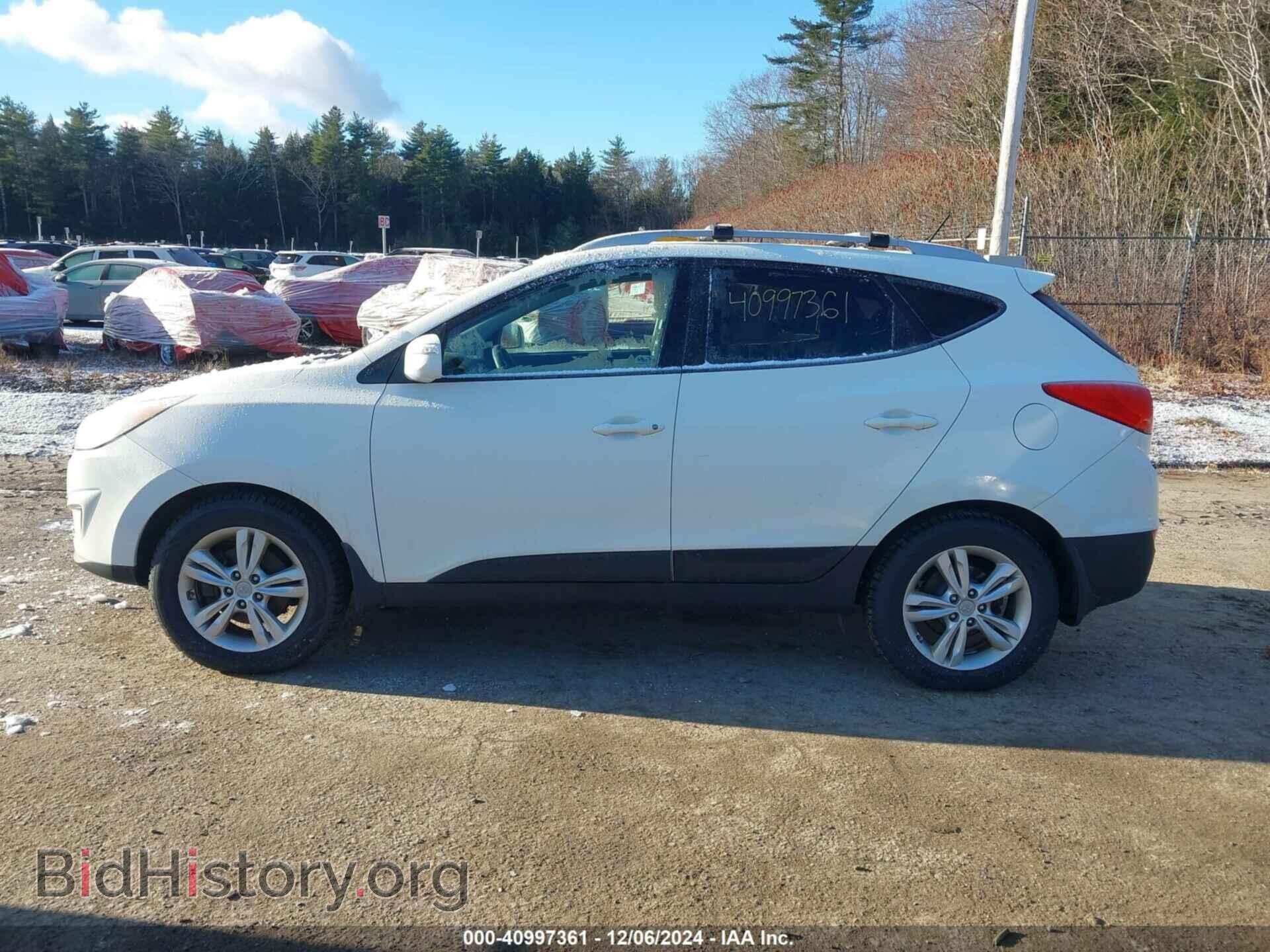 2012 HYUNDAI TUCSON - VIN: KM8JUCAC7CU421306 - Фото 12