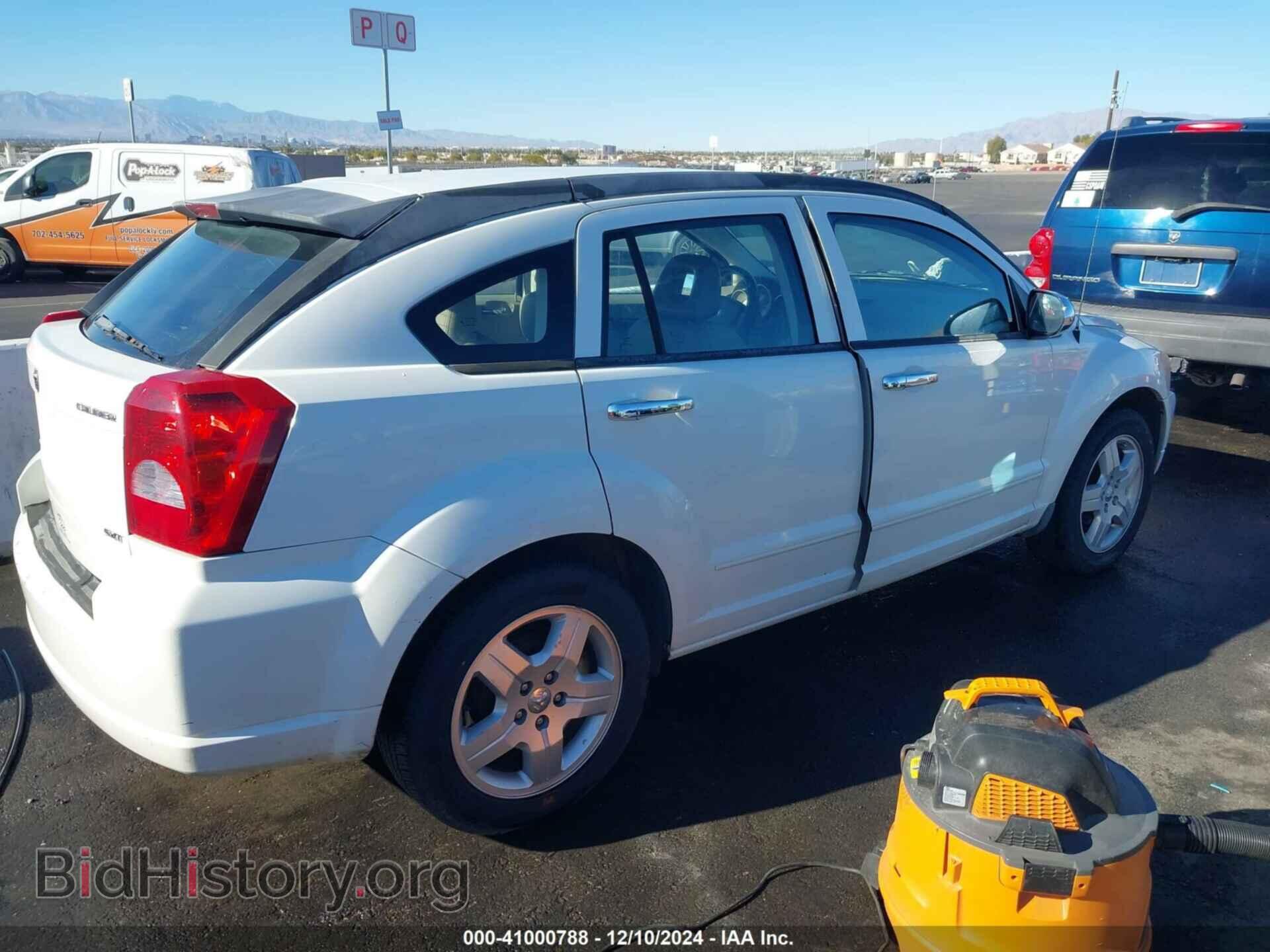 2009 DODGE CALIBER - VIN: 1B3HB48A29D157215 - Фото 4