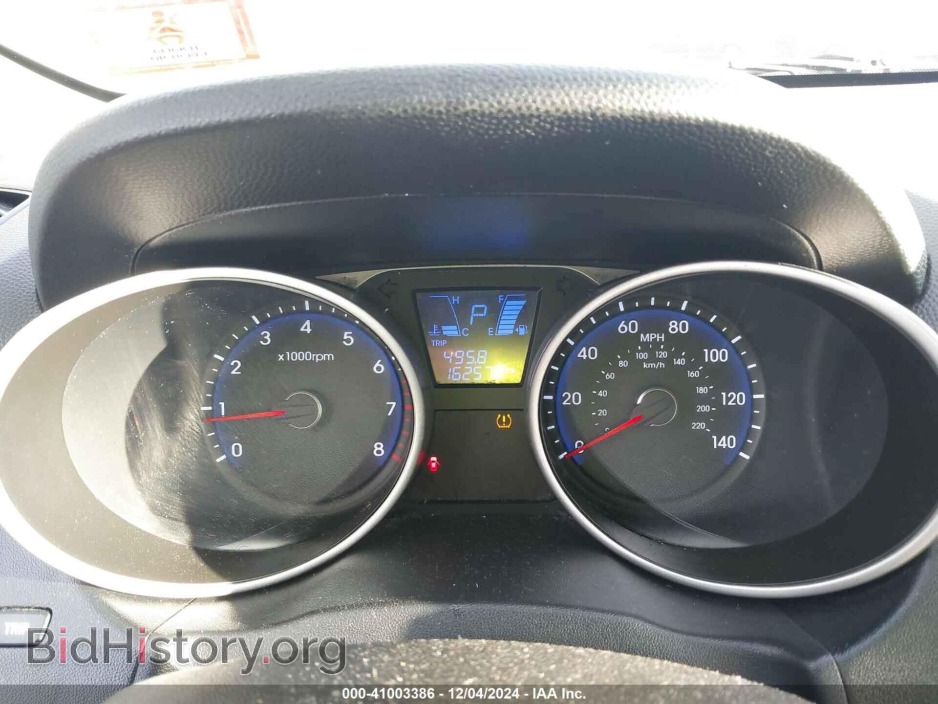2012 HYUNDAI TUCSON - VIN: KM8JUCAC2CU394645 - Фото 7