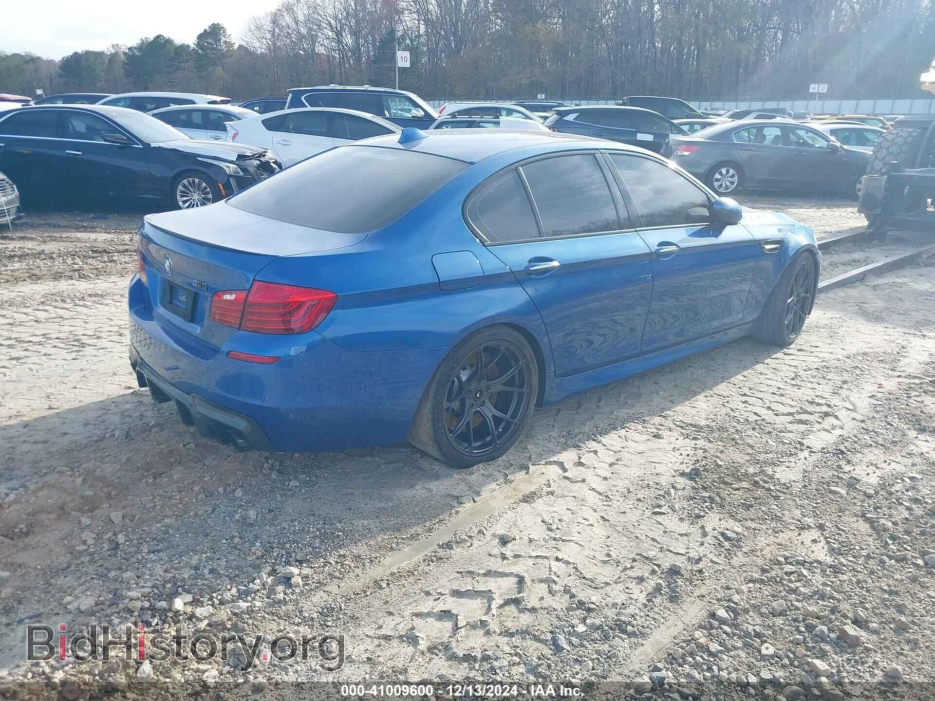 2014 BMW M5 - VIN: WBSFV9C52ED097296 - Photo 4