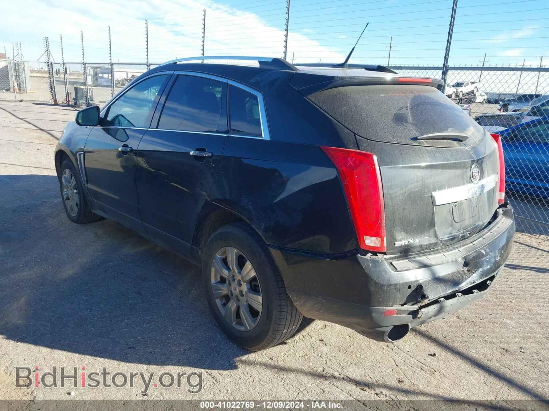 2014 CADILLAC SRX - VIN: 3GYFNEE35ES548713 - Фото 3